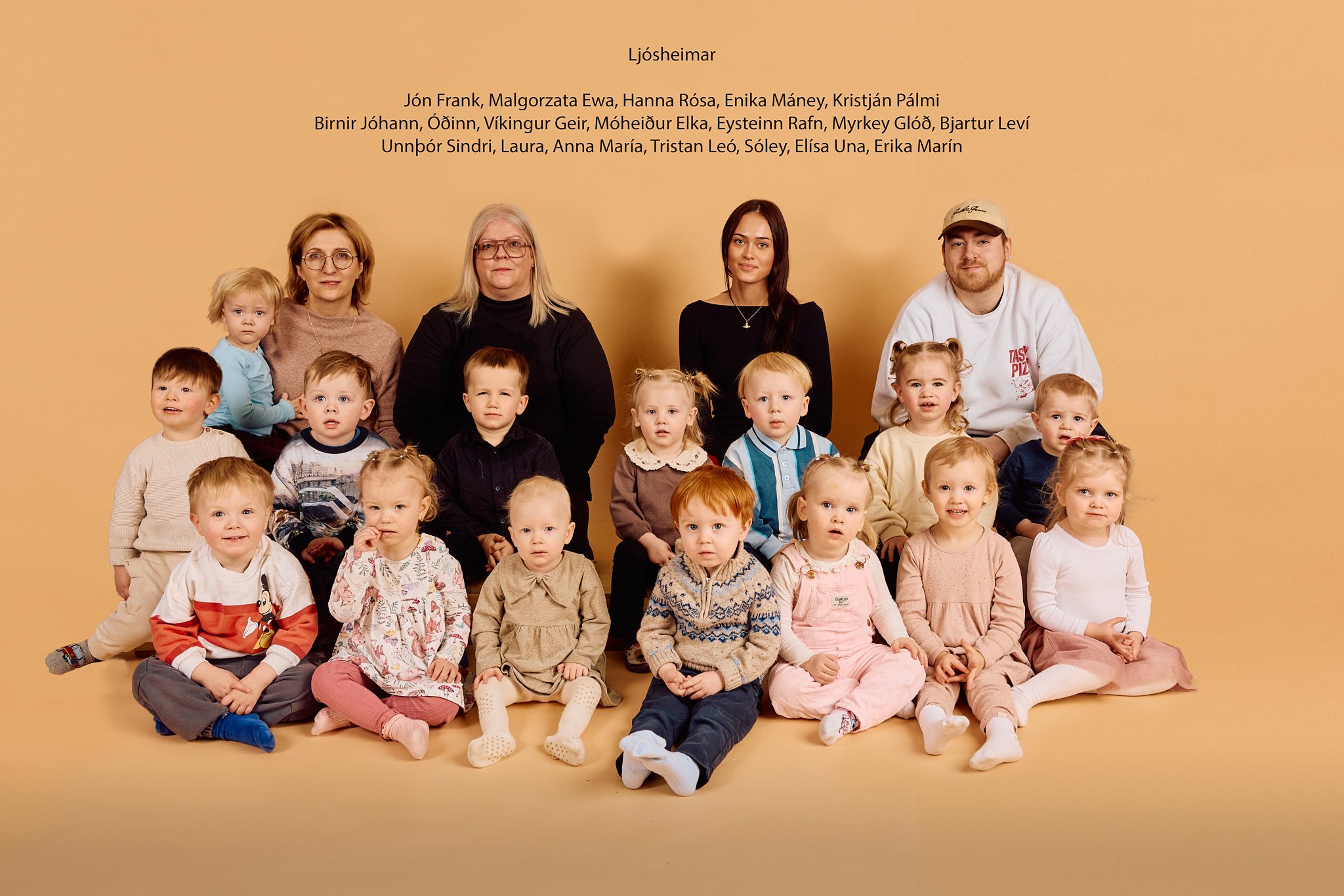 Group photo of children, three women, and two men against a beige background, with text listing names above them.