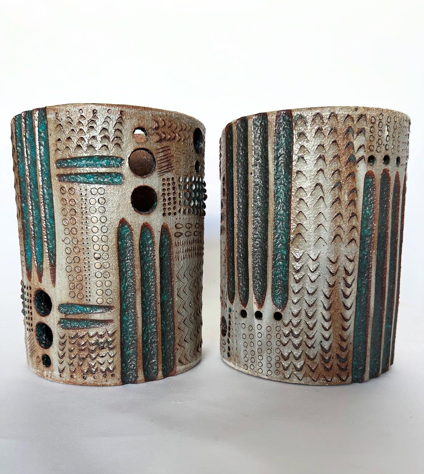 Wall mounted sconces. #hotfromthekiln #stoneware #heatherlevineceramics