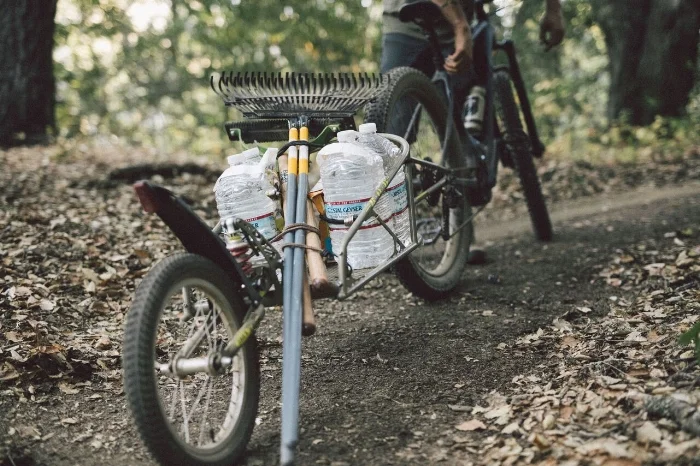 Essential Trio of Trail Tools: A basic rake, Pulaski for breaking up dirt, the Macleod rake with a square-edge hoe and Sandvik brush axe for cutting.