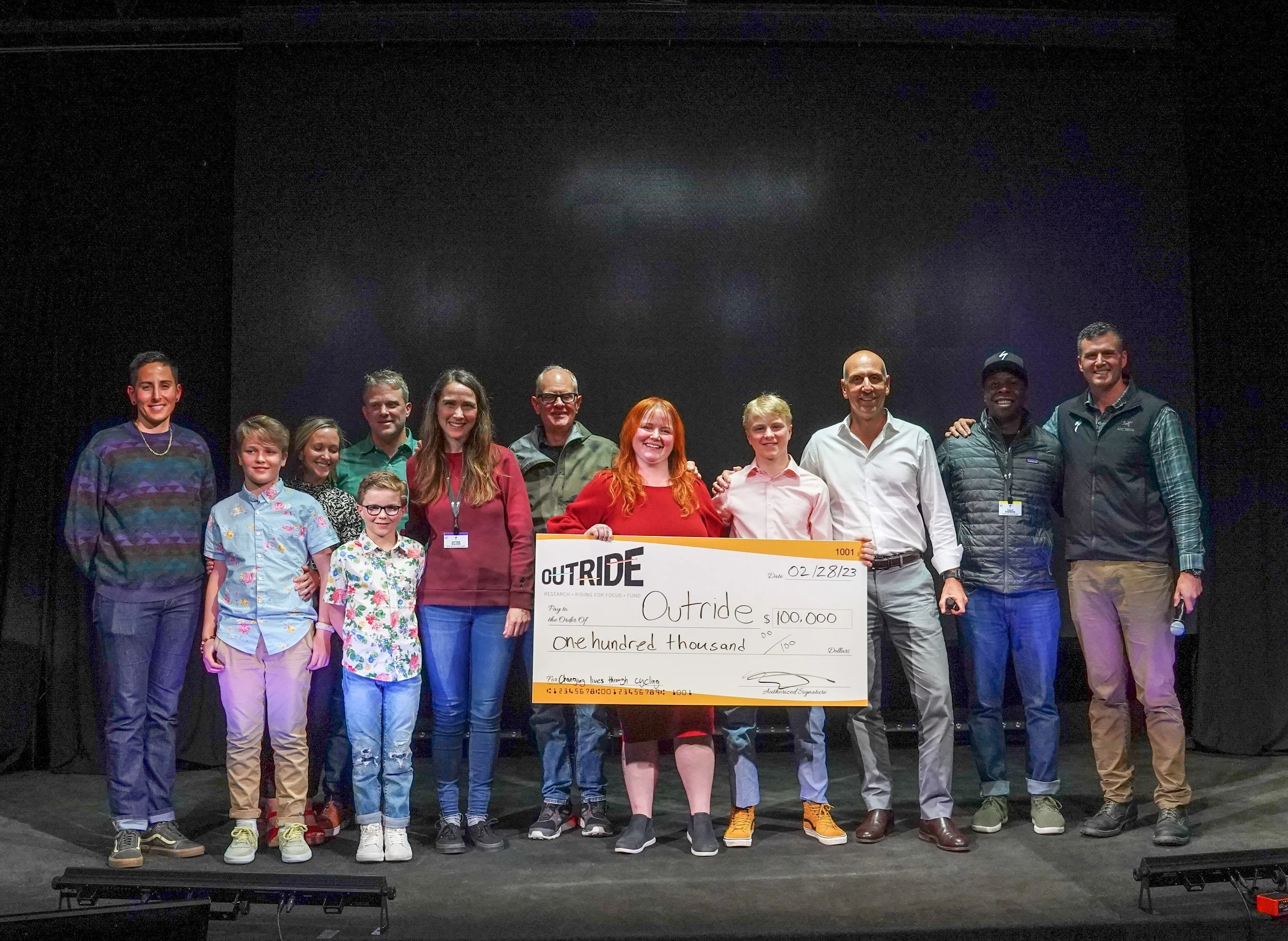Strata Worldwide Donates $100,000 To Change Lives Through Cycling with Outride