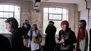 Audience at Time & Vision at the Barge House in London, 2012, viewing Ocularanagluphos, 