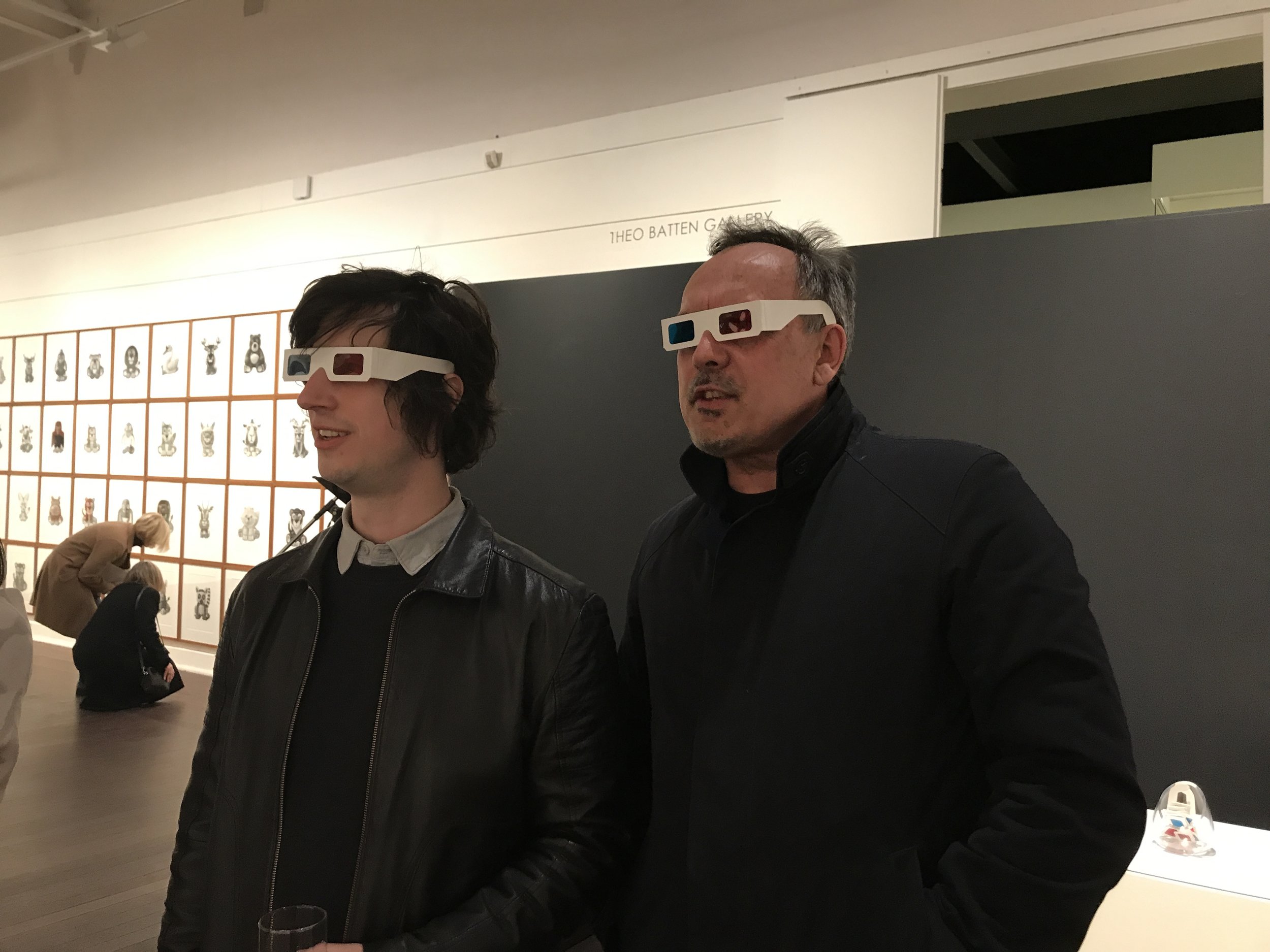 Fellow exhibiting artists Tony Curran and Michael Kempson enjoying the optical illusion of Ocularanagluphos in Aura: Repetition, Reproduction, and the Mark of the Artist