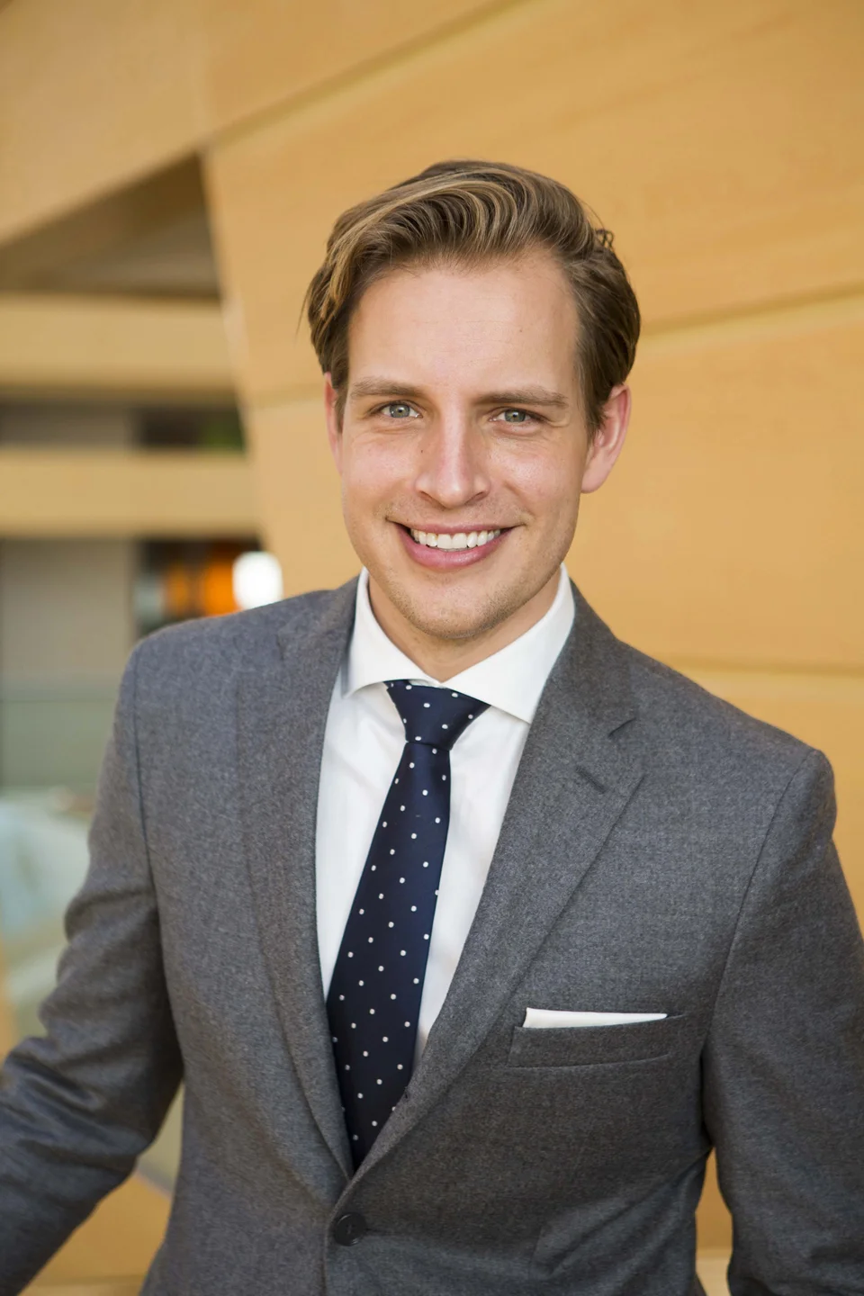 professional man in suit and tie smiling