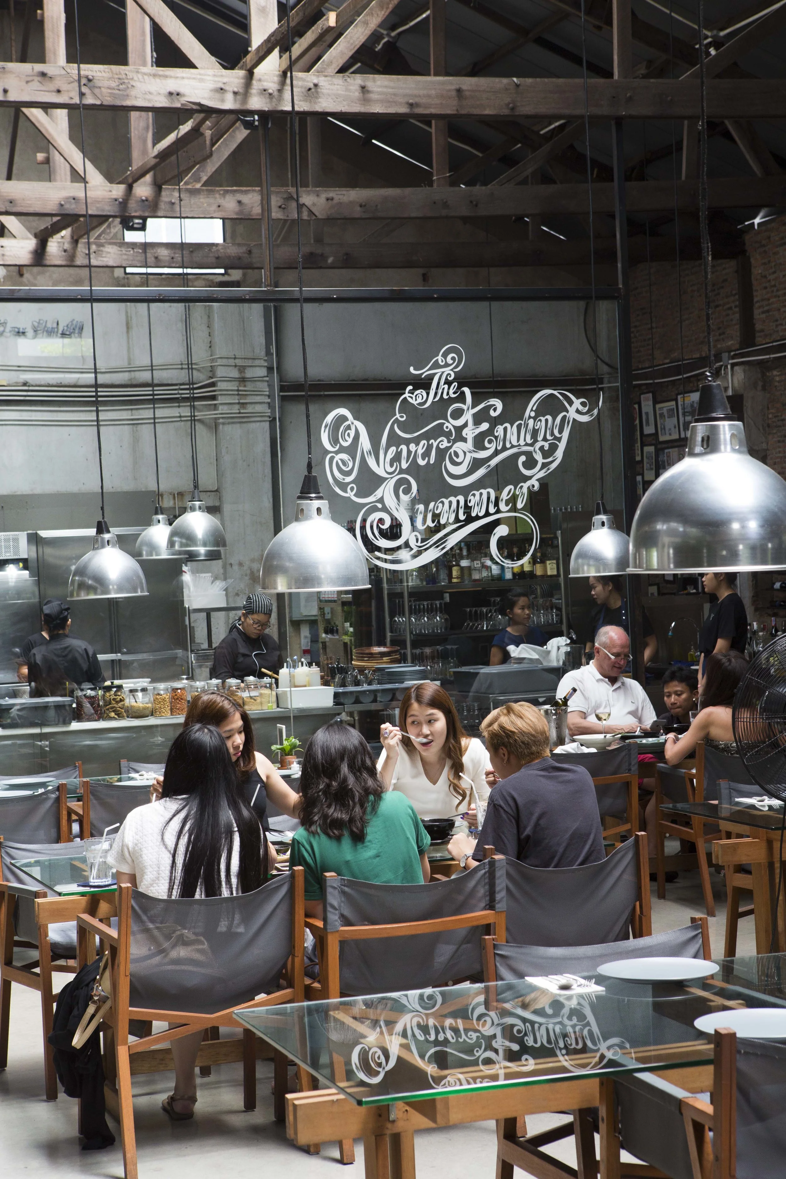 People sitting down eating in restaurant