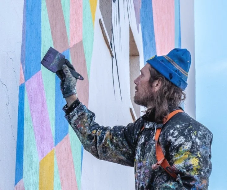 Our lead artists, ATMA painting a mural.