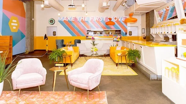 Bumble hosted The Hive at SXSW 2019, a cafe with a graphic wall perfectly setup to promote the creation of user generated content. Image from Adweek .