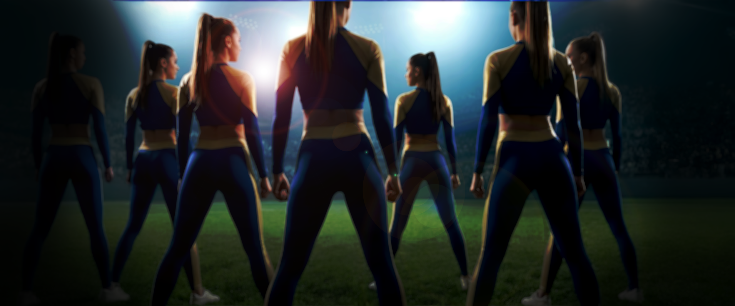 pro dancers on field blurred-vinette-dark.png