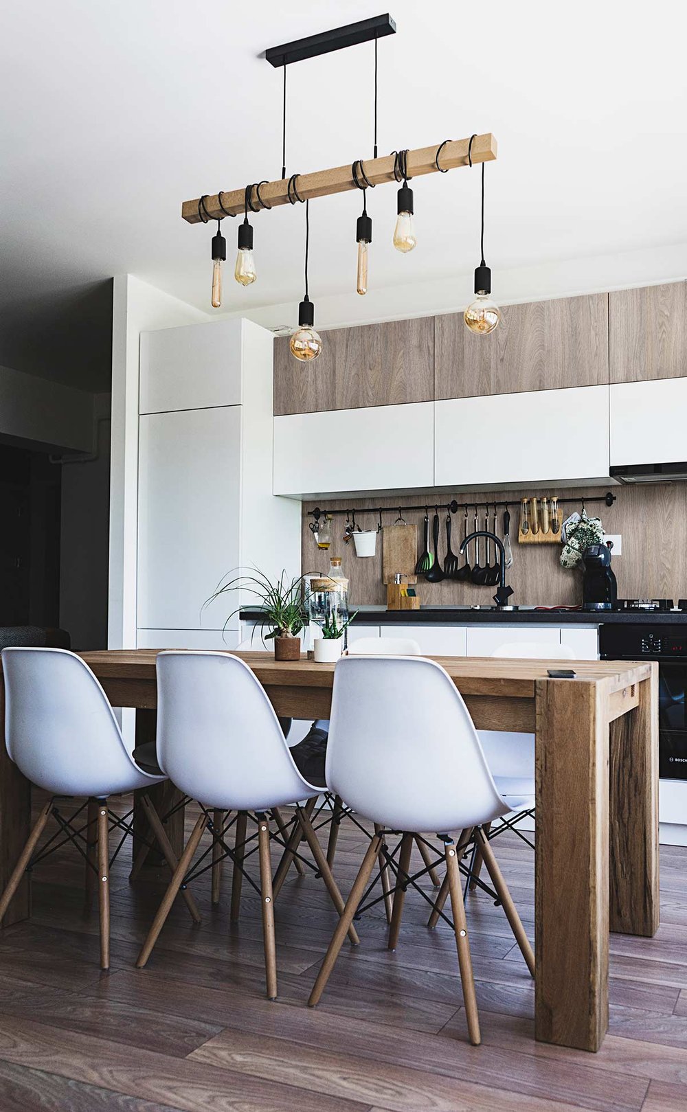 Modern kitchen with matte white and warm gray woodgrain cabinets