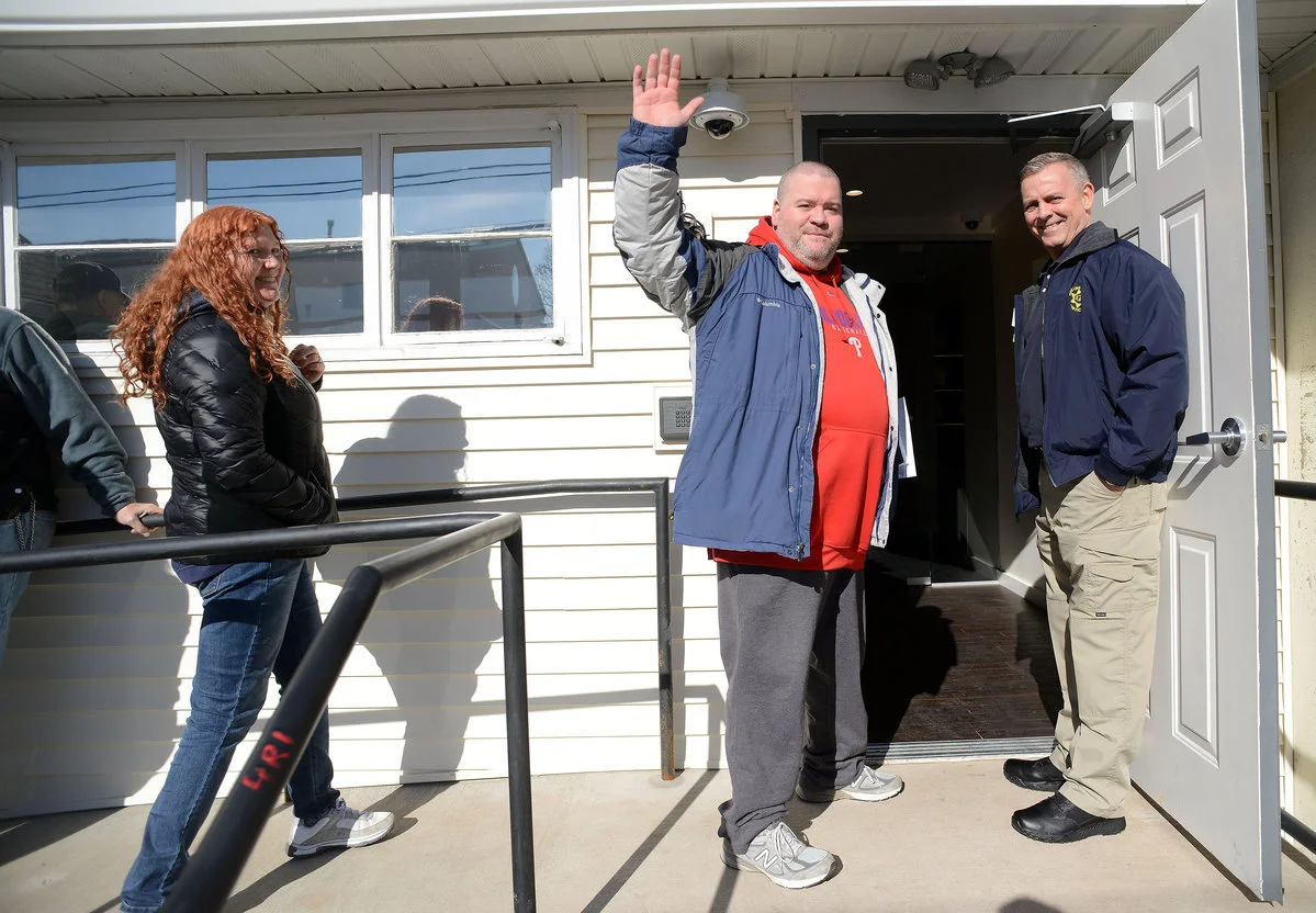 Thom Shannon waves as he is allowed in for his appointment at TerraVida Holistic Center in Sellersville.