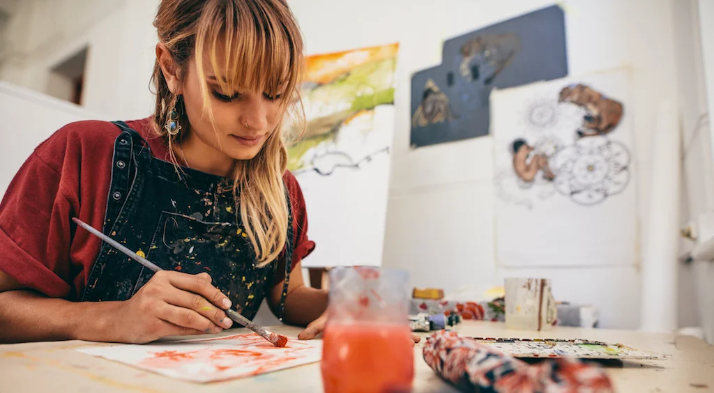 Canva - Female Artist Painting in Studio.jpg