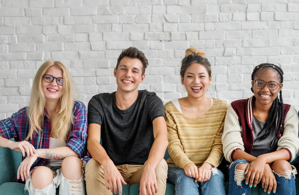 Canva - Diverse Group People Sitting Couch Concept.jpg