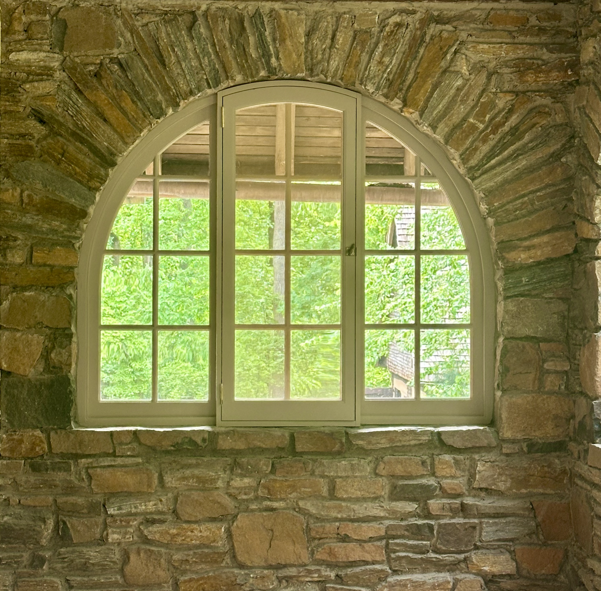 Stone Arch Window with Custom Copper Screen