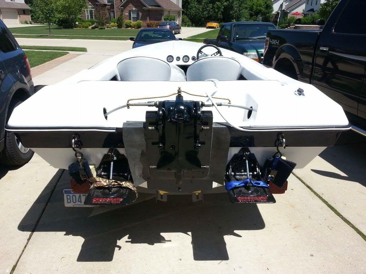 The redone trim tabs, transom and rigging ready for the big Mercury 150. 