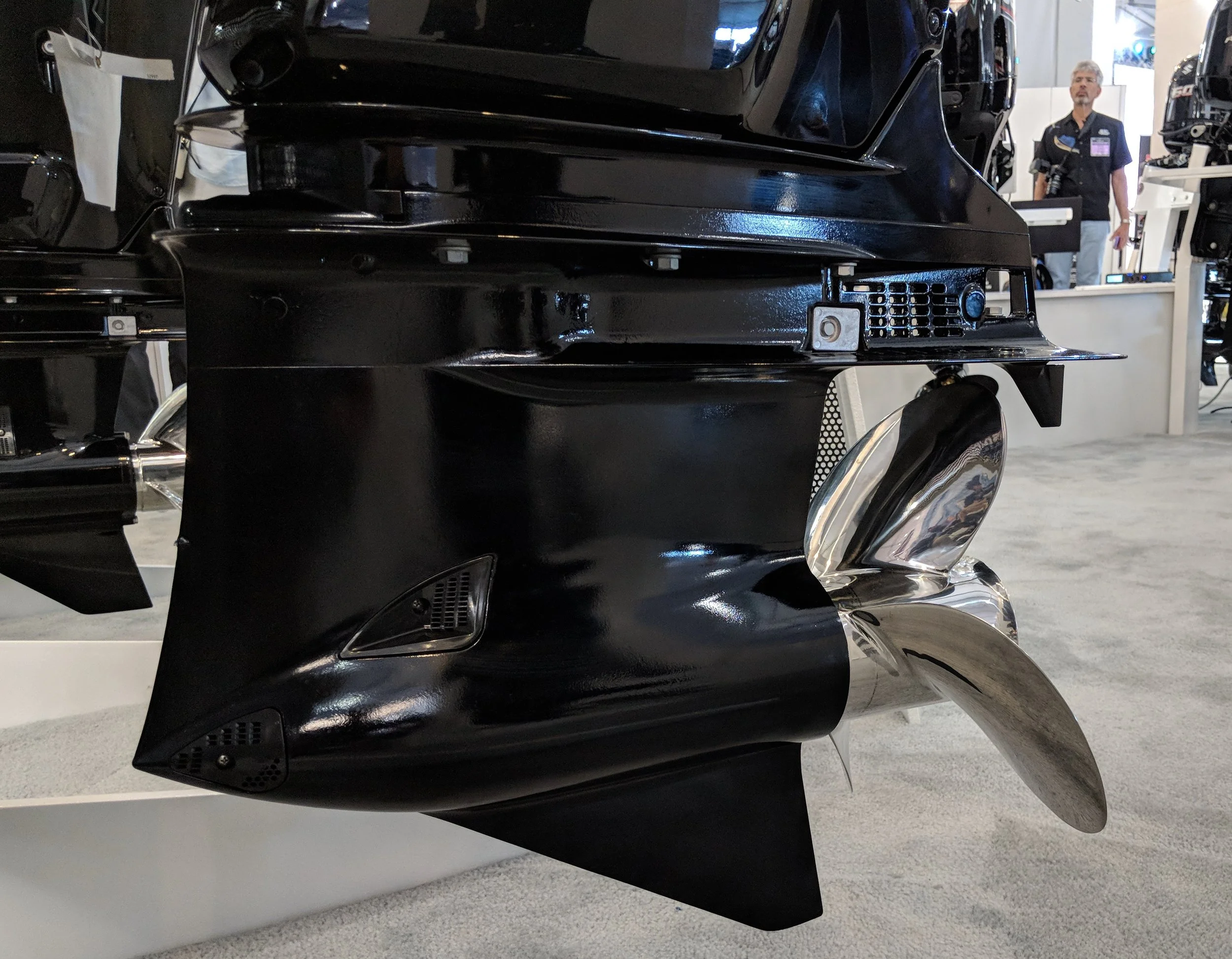 This is a fairly performance orientated lower unit, seen on this Suzuki 300. The big fishing and center console boats are getting faster and faster. Nice engine with a bullet nose, low water pickups, but a little heavy for real performance use, and sloppy mounts. Looks cool though. 