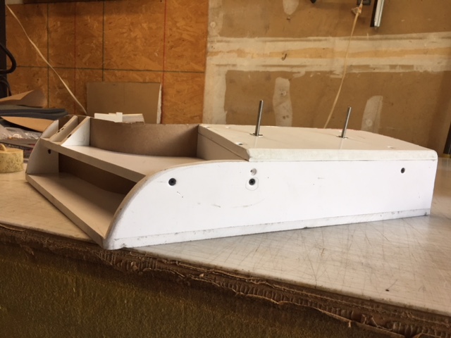 Custom armrest required cutting the frame to fit the boat. 