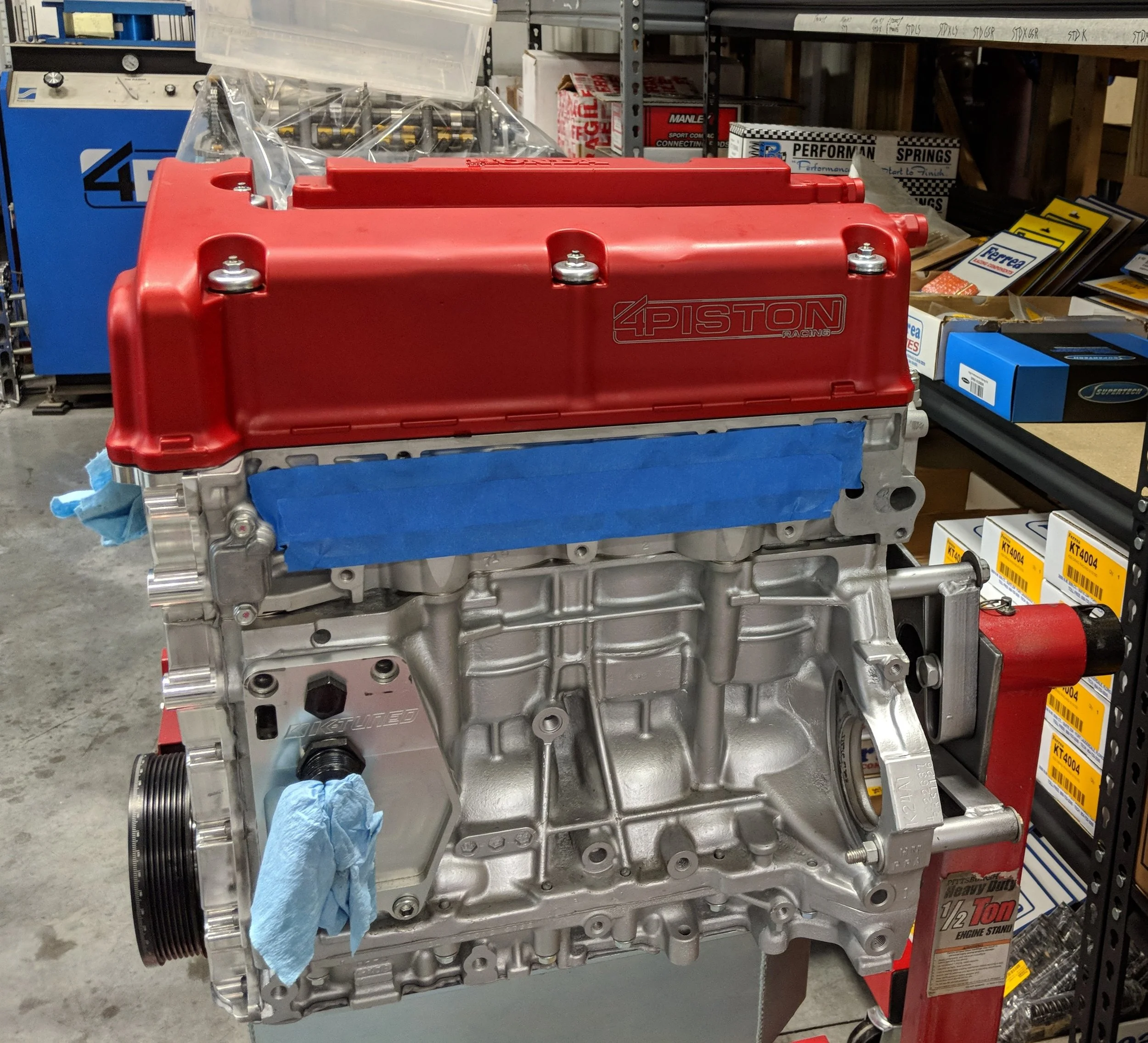 4 Piston Racing focuses primarily on Honda, and their cylinder heads and race engines are incredible, and border on art work, with the impeccable attention to detail. They also make insane power. A K24 seen here.