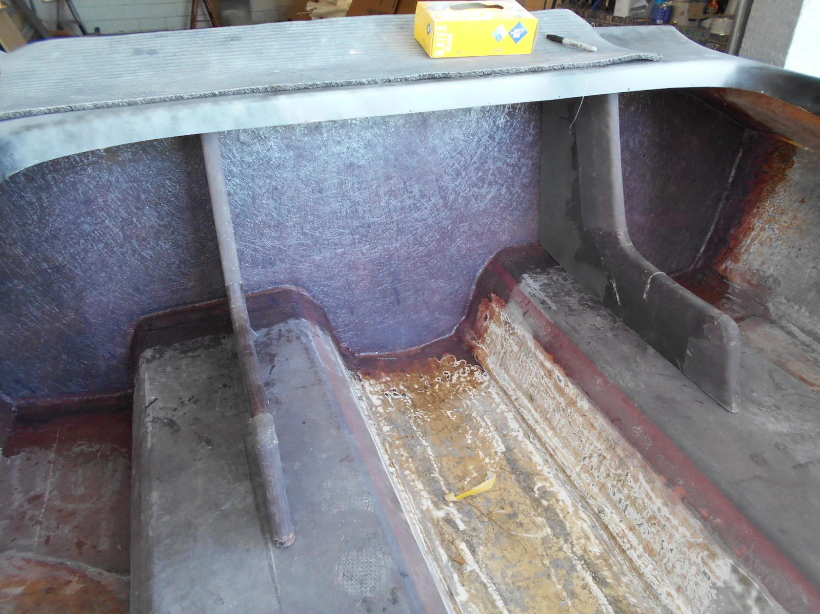 The new transom and knees, ready to sealed in with epoxy paint.