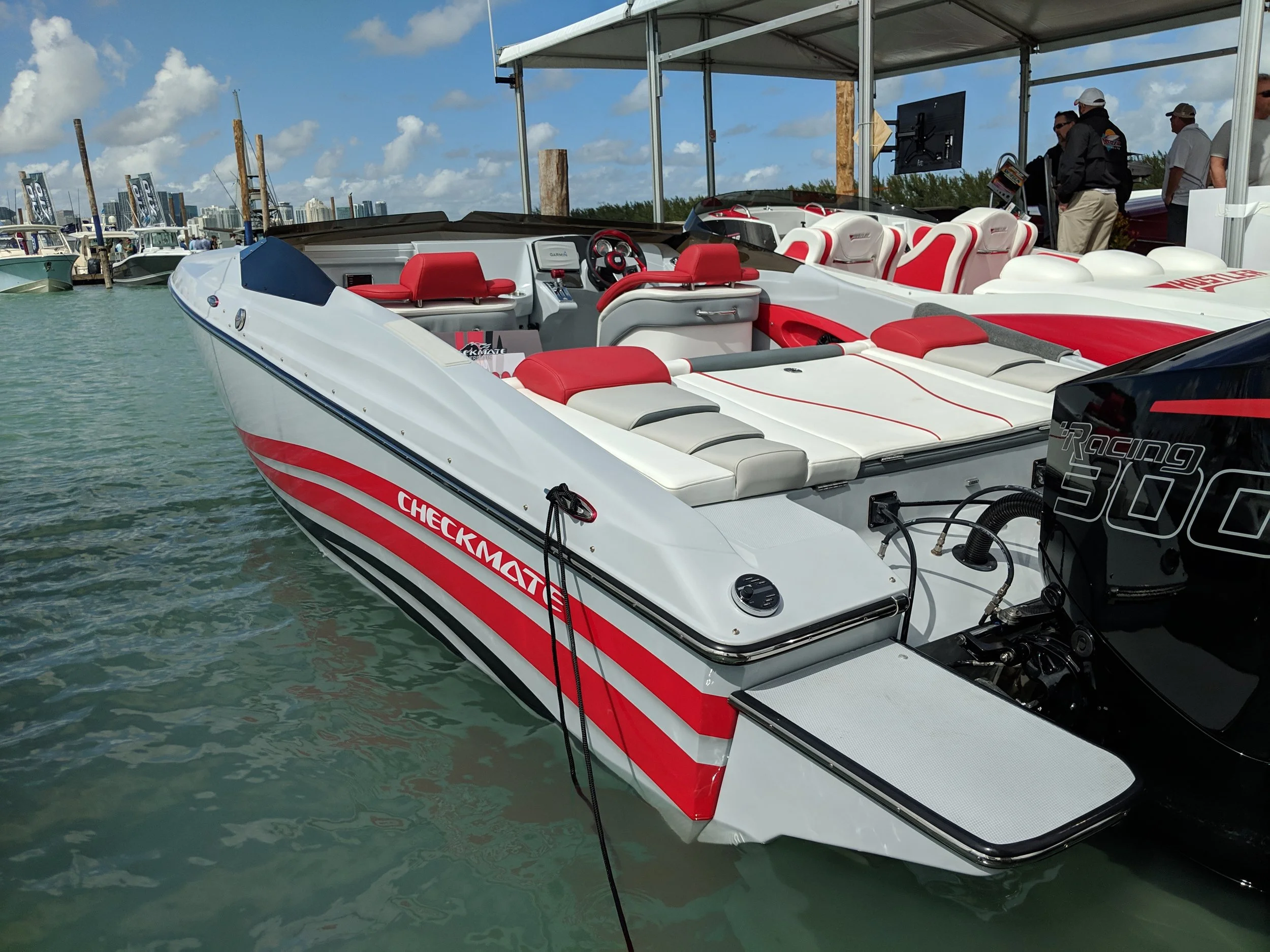 The Checkmate Convincor 260 Outboard looks good in this grey finish and red stripes. The boat has an old school look, and suits outboards pretty well.