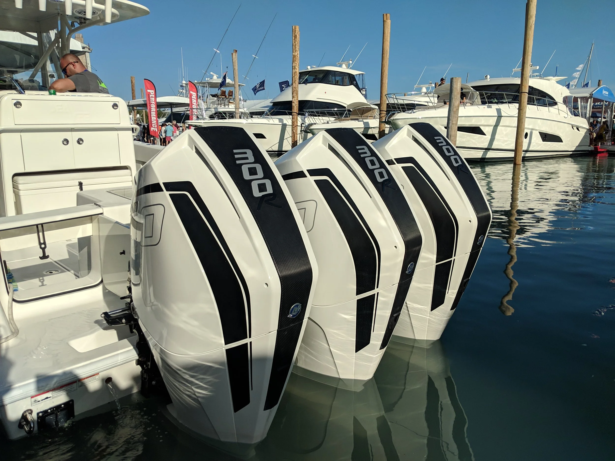A custom painted set of triple Mercury Racing 300Rs. in the 300 to 350 HP range, nothing can perform like these. You see them on everything from sport cats, to big center consoles. Versatile and excellent power to weight, plus can be configured multiple ways.