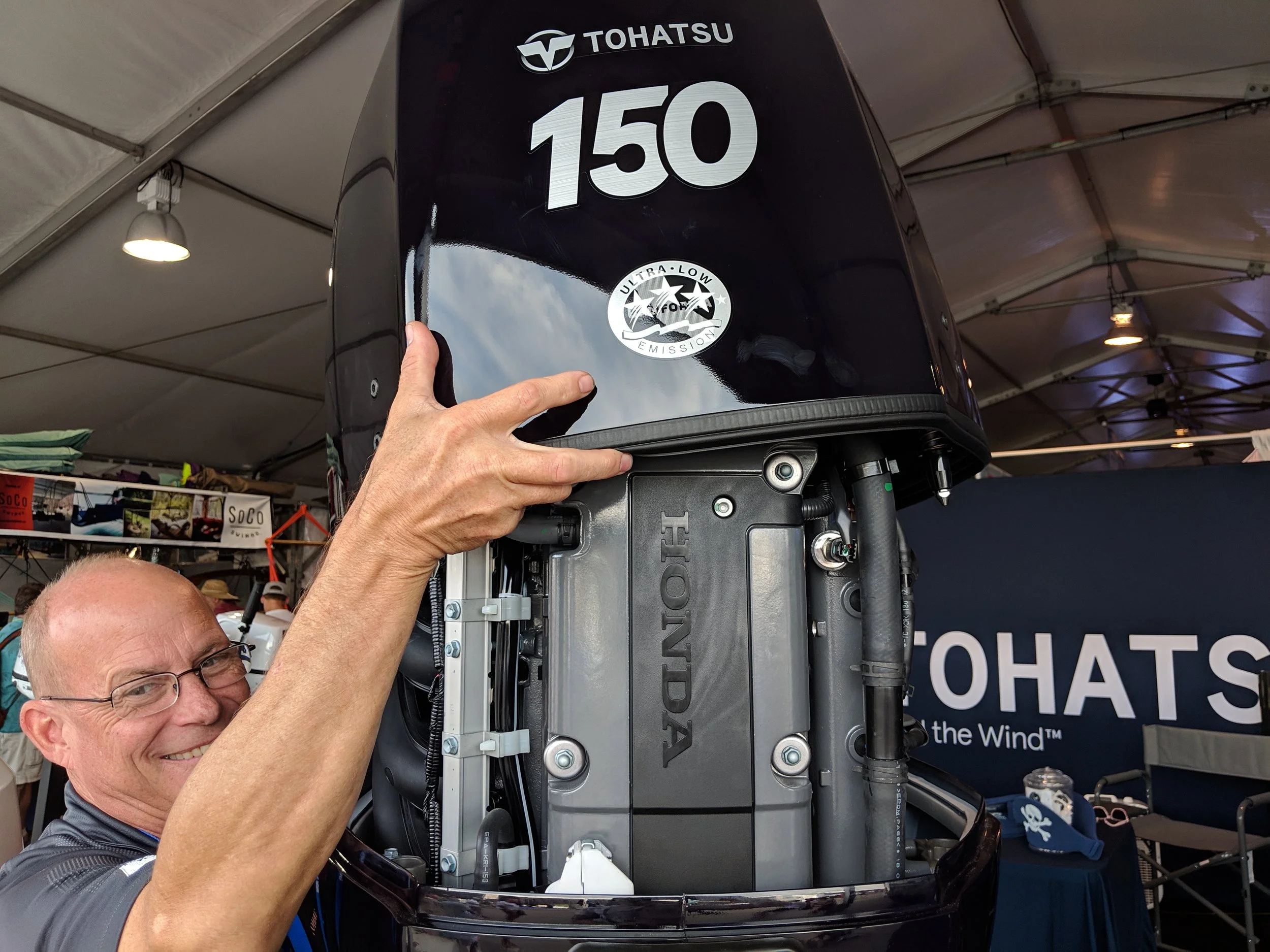 Surprise, it’ s a Honda. If you like dark blue, and saving money, this is your engine, the Tohatsu 150.
