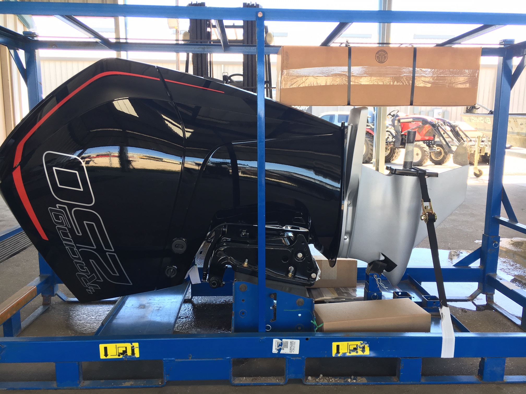 The 250R getting ready to be setup on the Mirage. Moving the battery forward, and running with 12” of setback helped the boat handle the change in weight.