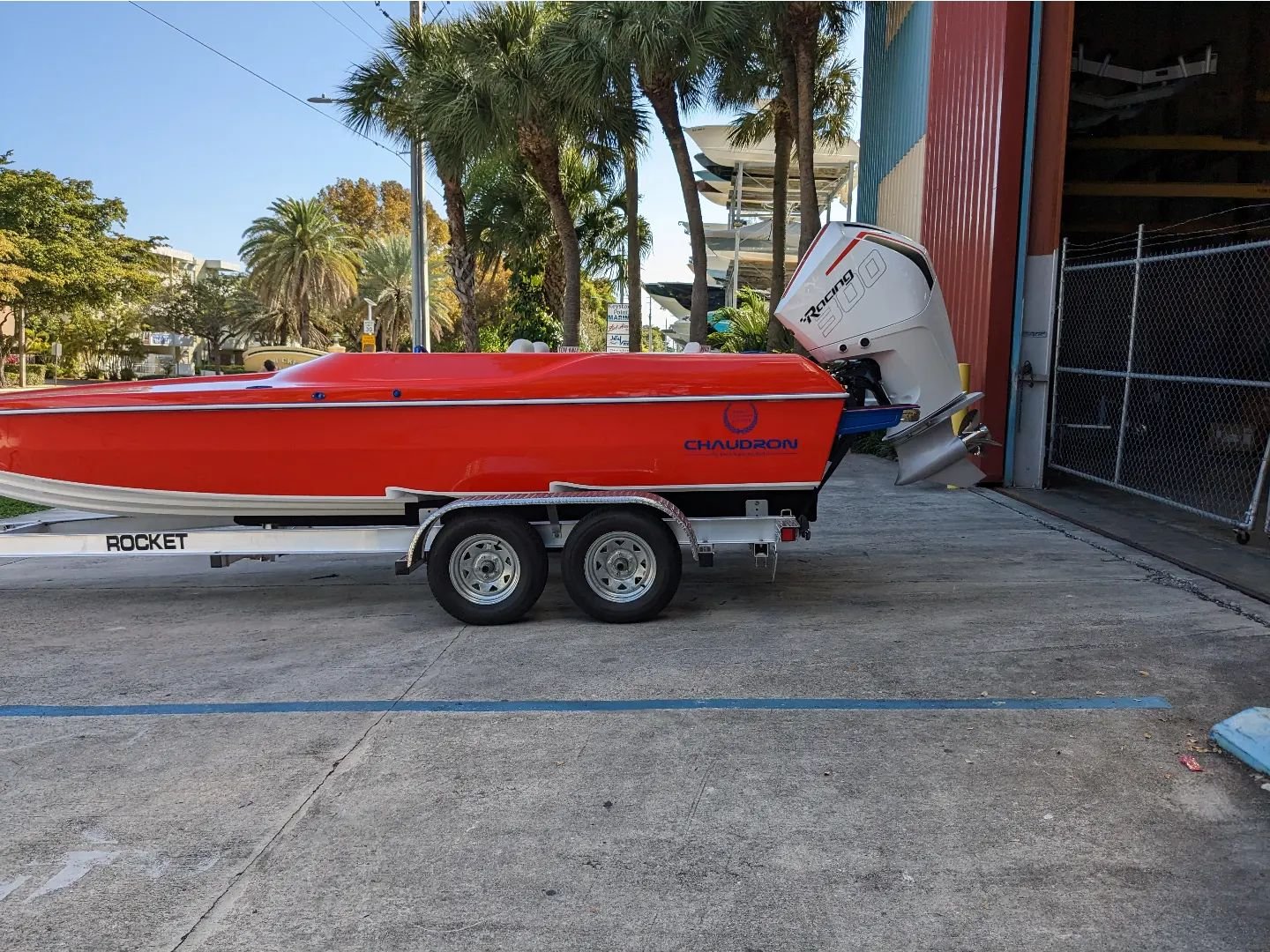 Chaudron Pro S-22 with Mercury Racing 300R HD. DTS, vessel view, Livorsi gauges, orange gelcoat, swim steps. Blue hardware. Rocket aluminum trailer. 
#chaudronmiami #mercuryracing