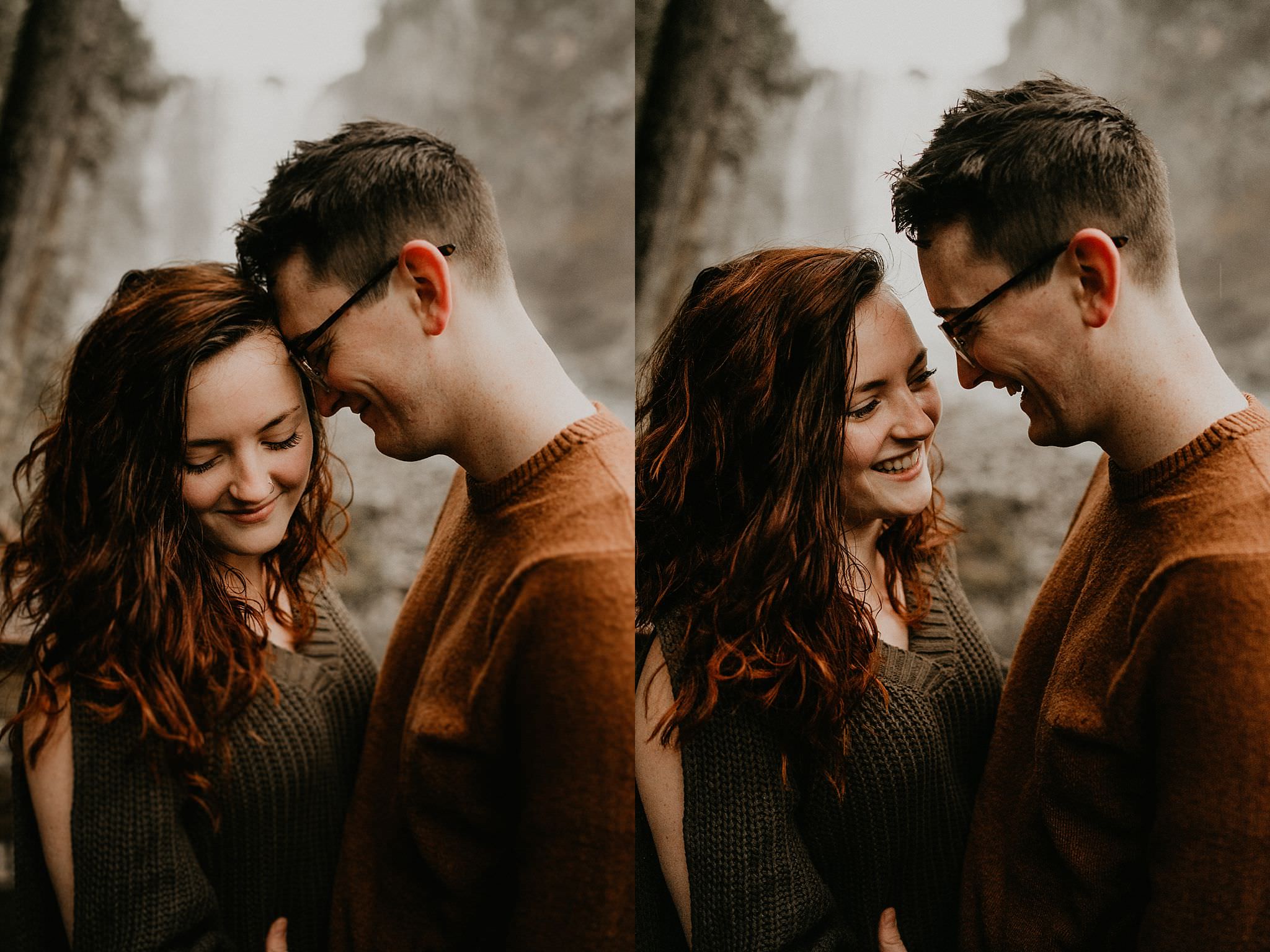Intimate moment in front of waterfall in Washington engagement photo