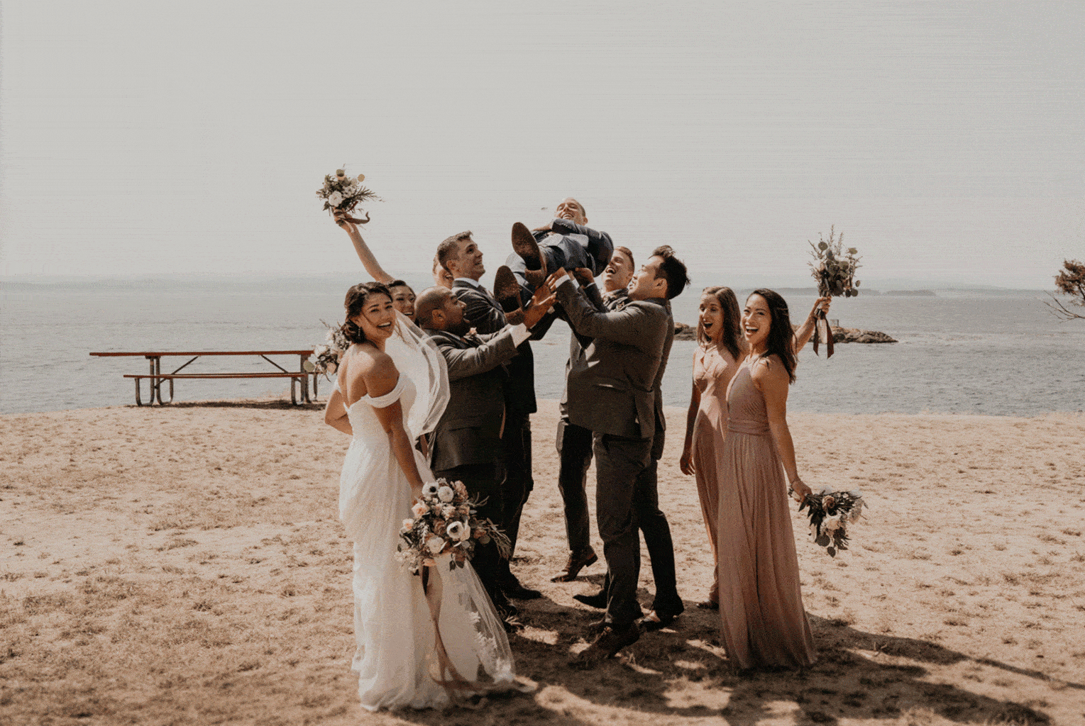 Roche Harbor Resort wedding bridal party celebrating the newly weds
