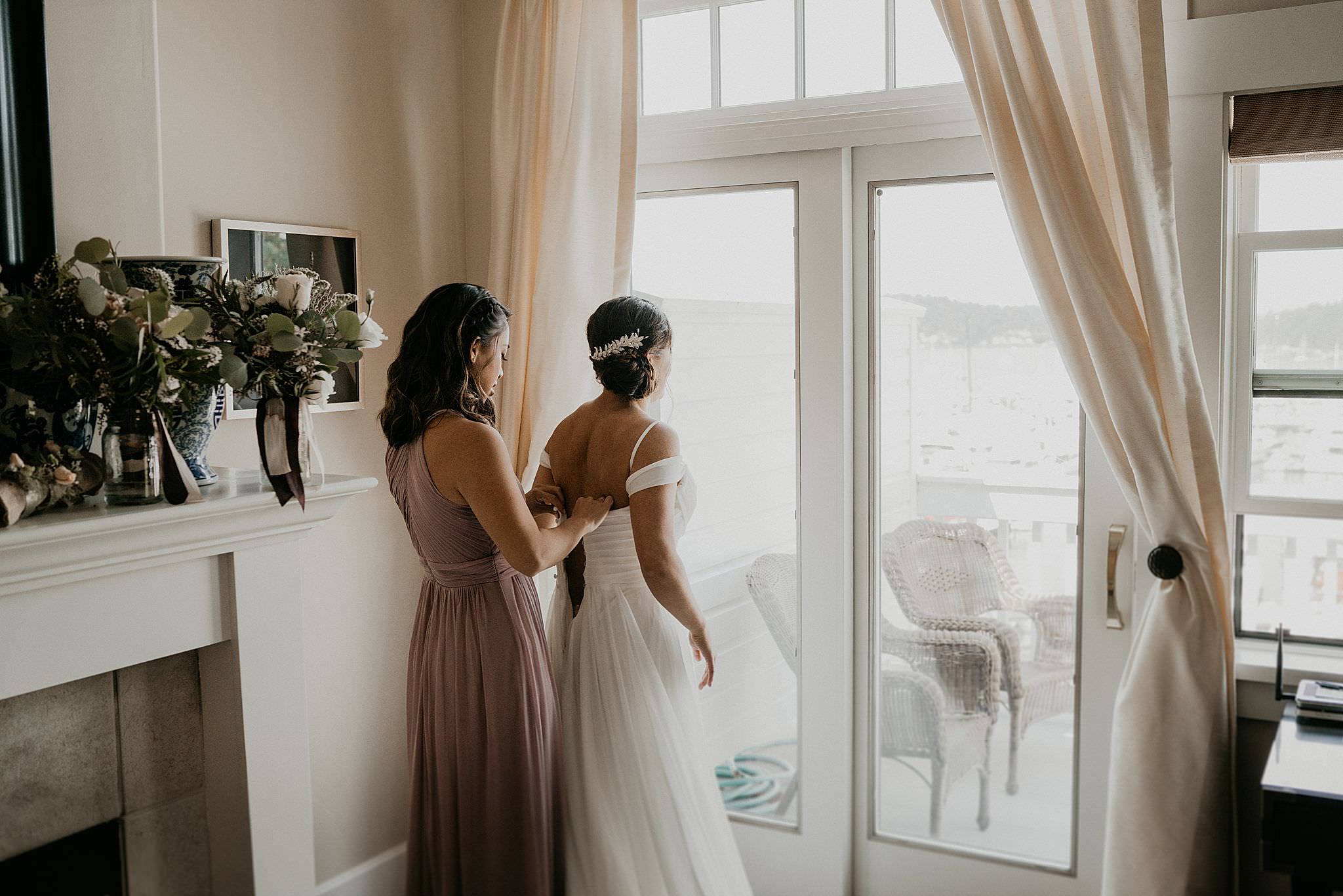 Bride getting ready with her bridesmaids at Roche Harbor