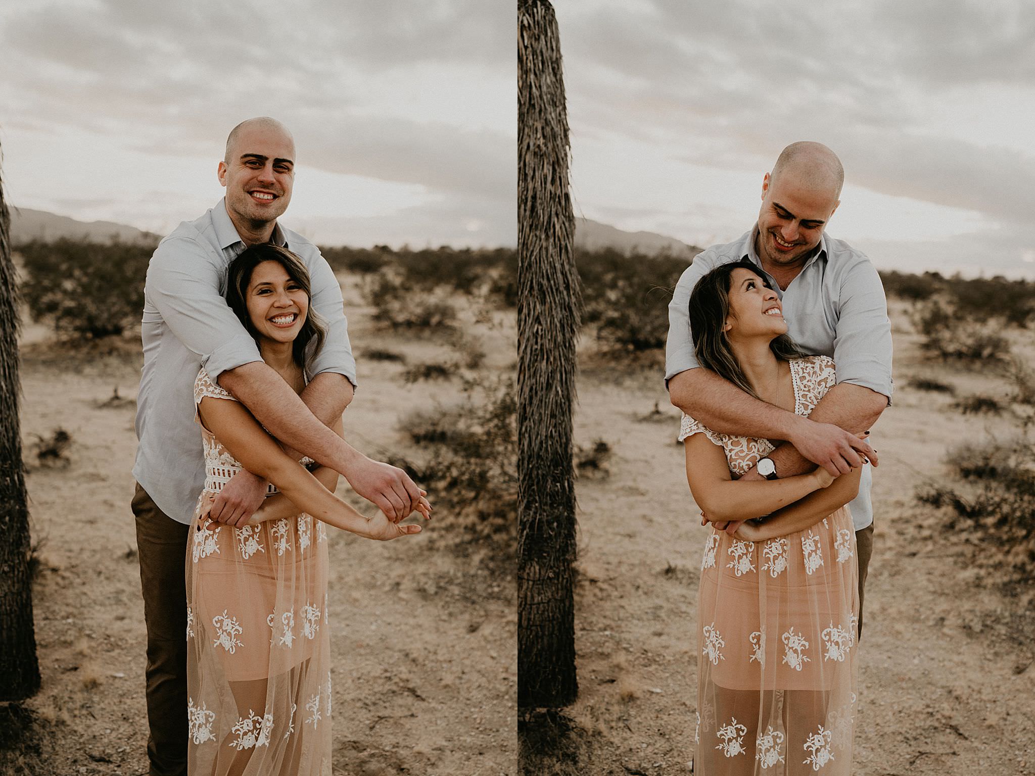 Couple holding each other during sunset at Joshua Tree National Park for their engagement photos