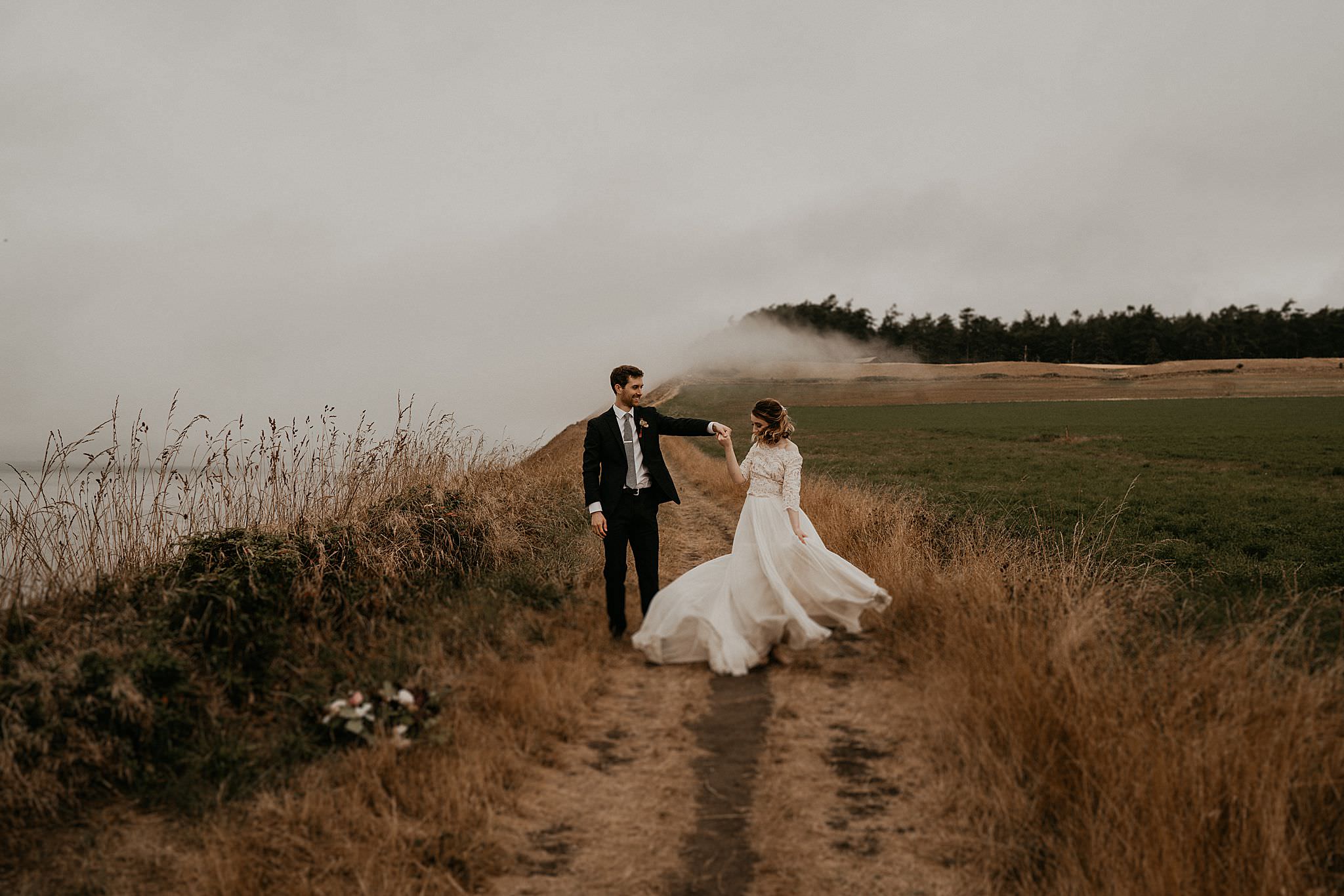 Newly weds celebrating their intimate elopement on Whidbey Island near deception pass