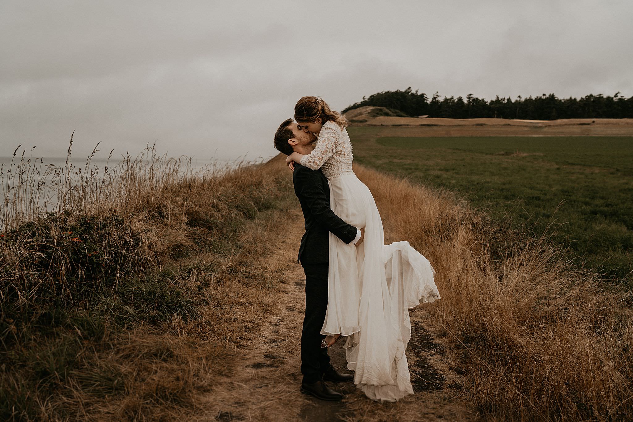 Newly weds celebrating their intimate elopement on Whidbey Island near deception pass