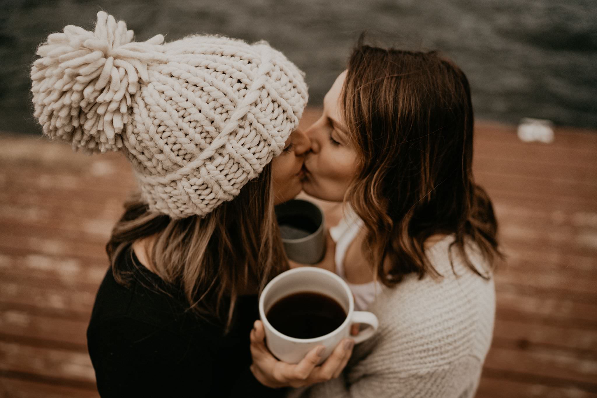 Lesbian couple kissing at Olympic National Park washington for their vow renewal