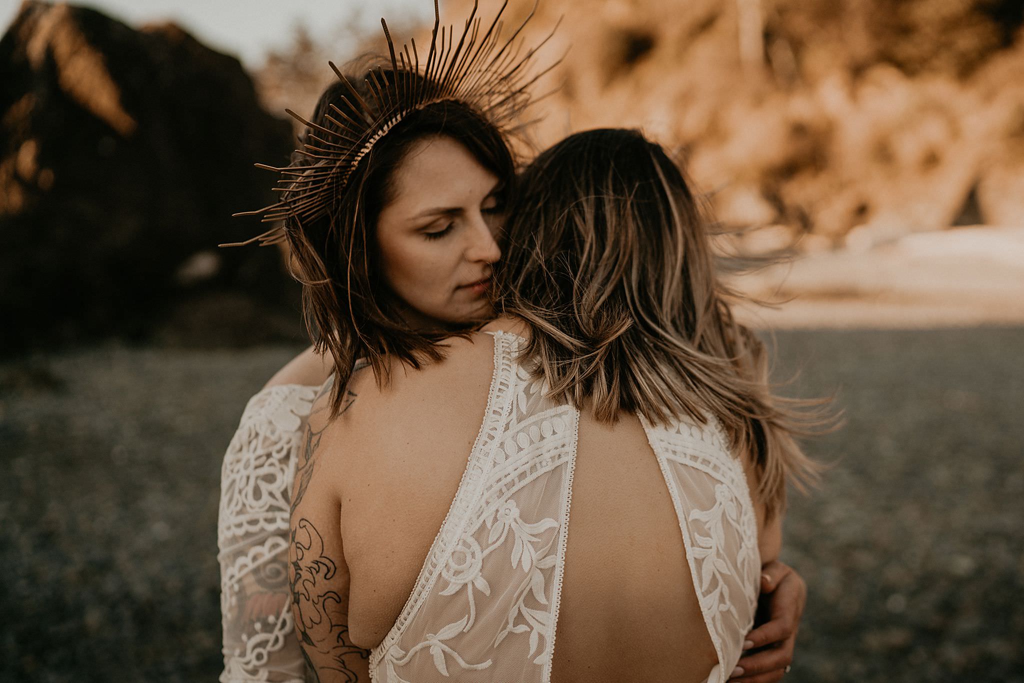 Lesbian brides at Ruby Beach elopement wearing bohemian Rue de seine dress from Seattle Dress Theory