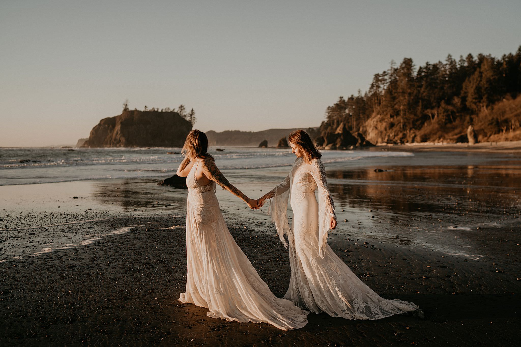 Lesbian brides at Ruby Beach elopement wearing bohemian Rue de seine dress from Seattle Dress Theory