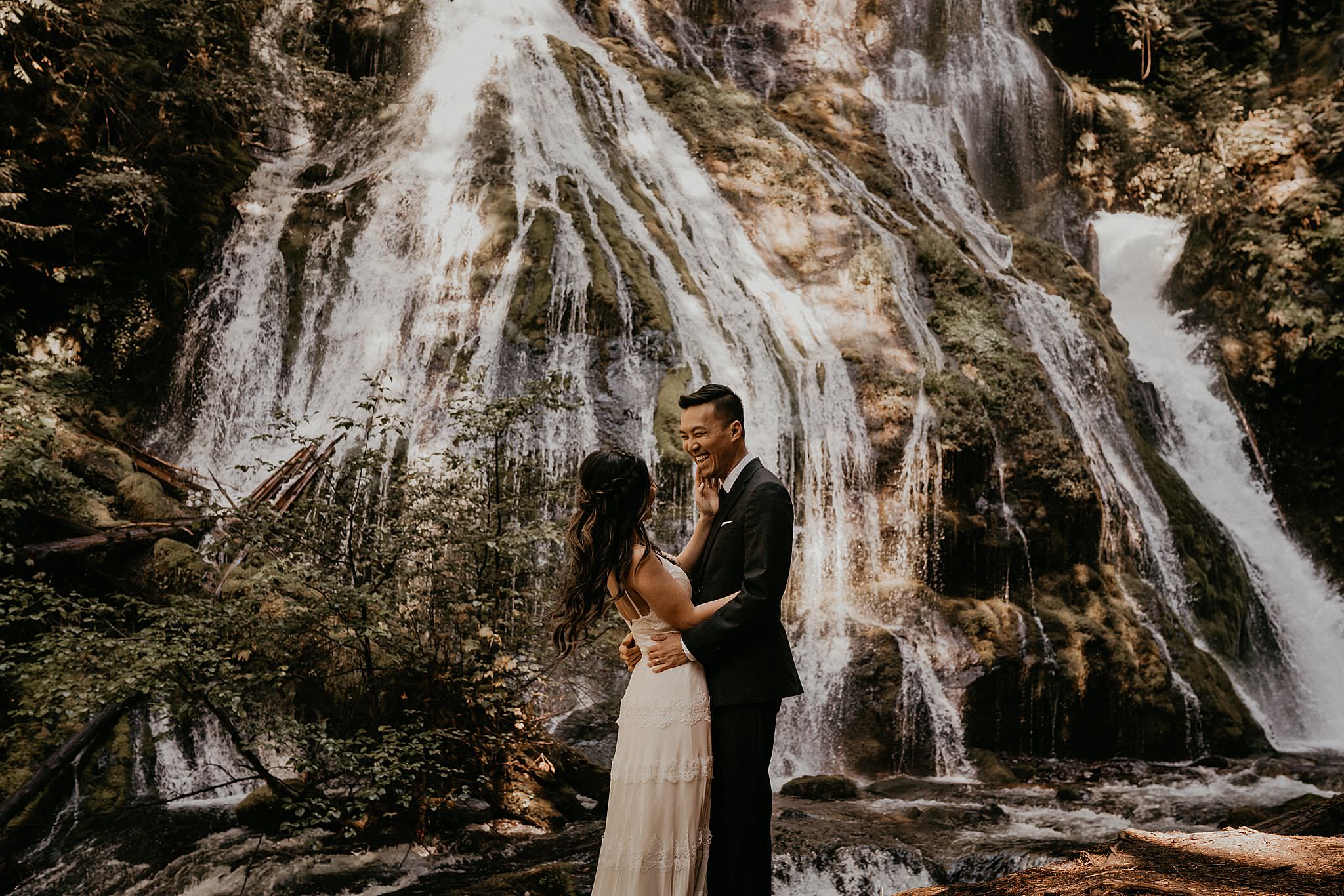 Beautiful bridal portraits at Panther Creek Falls for a forest elopement in Washington
