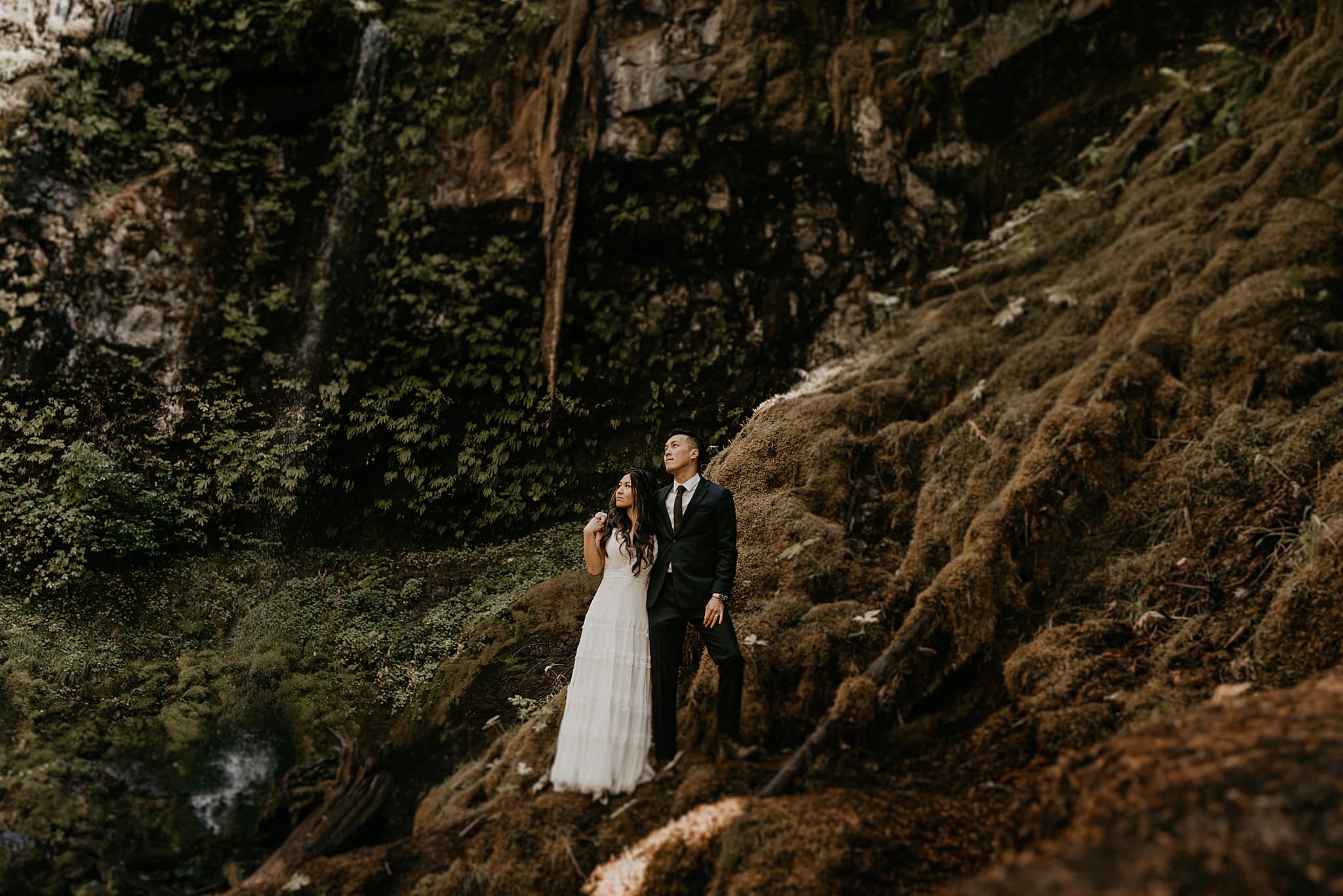 Beautiful bridal portraits at Panther Creek Falls for a forest elopement in Washington