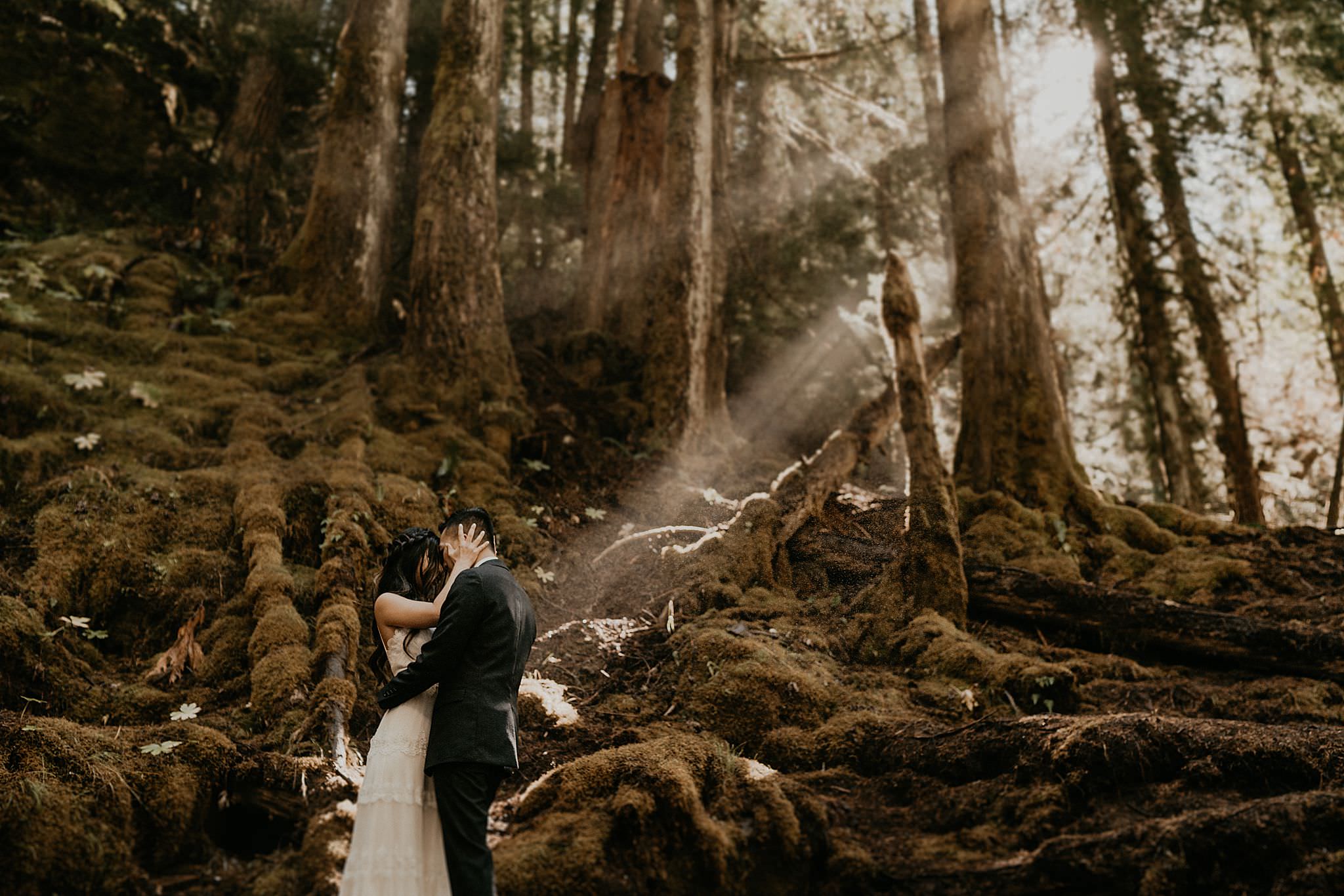 Beautiful bridal portraits at Panther Creek Falls for a forest elopement in Washington