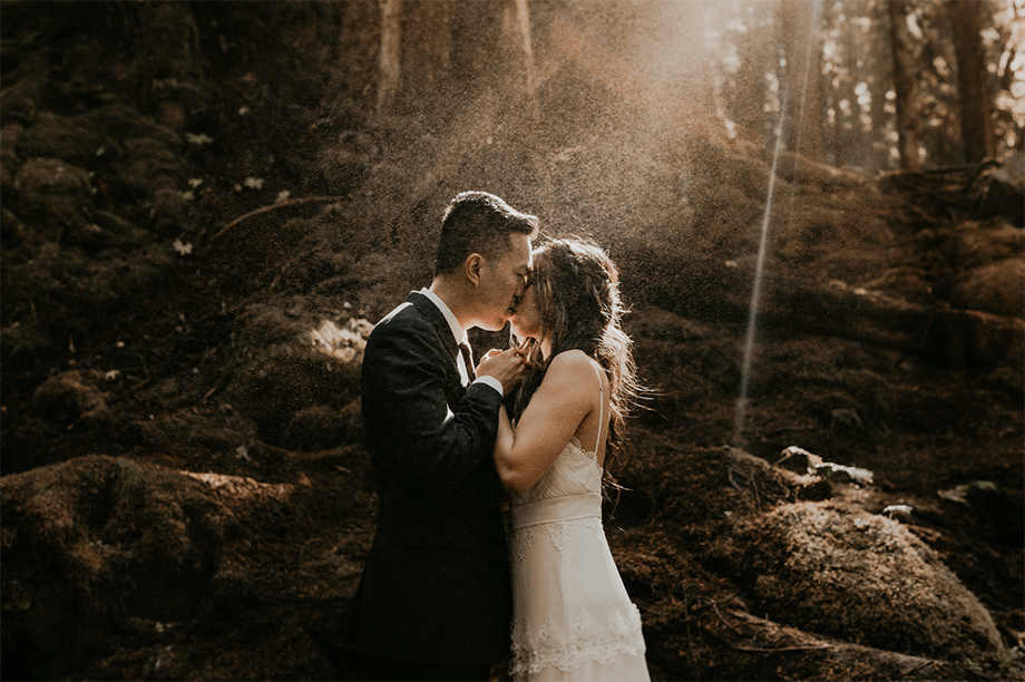 Beautiful bridal portraits at Panther Creek Falls for a forest elopement in Washington