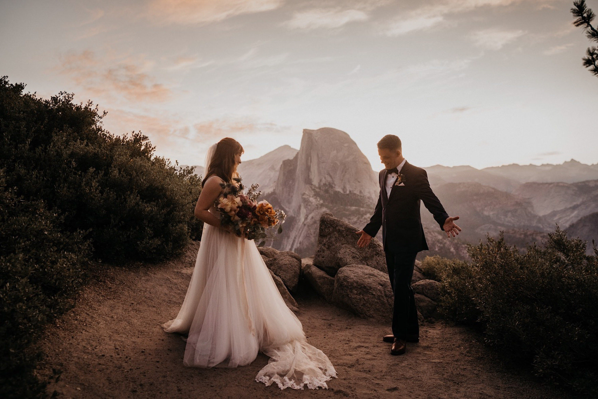 Yosemite elopement and wedding photographer with couple in glacier point