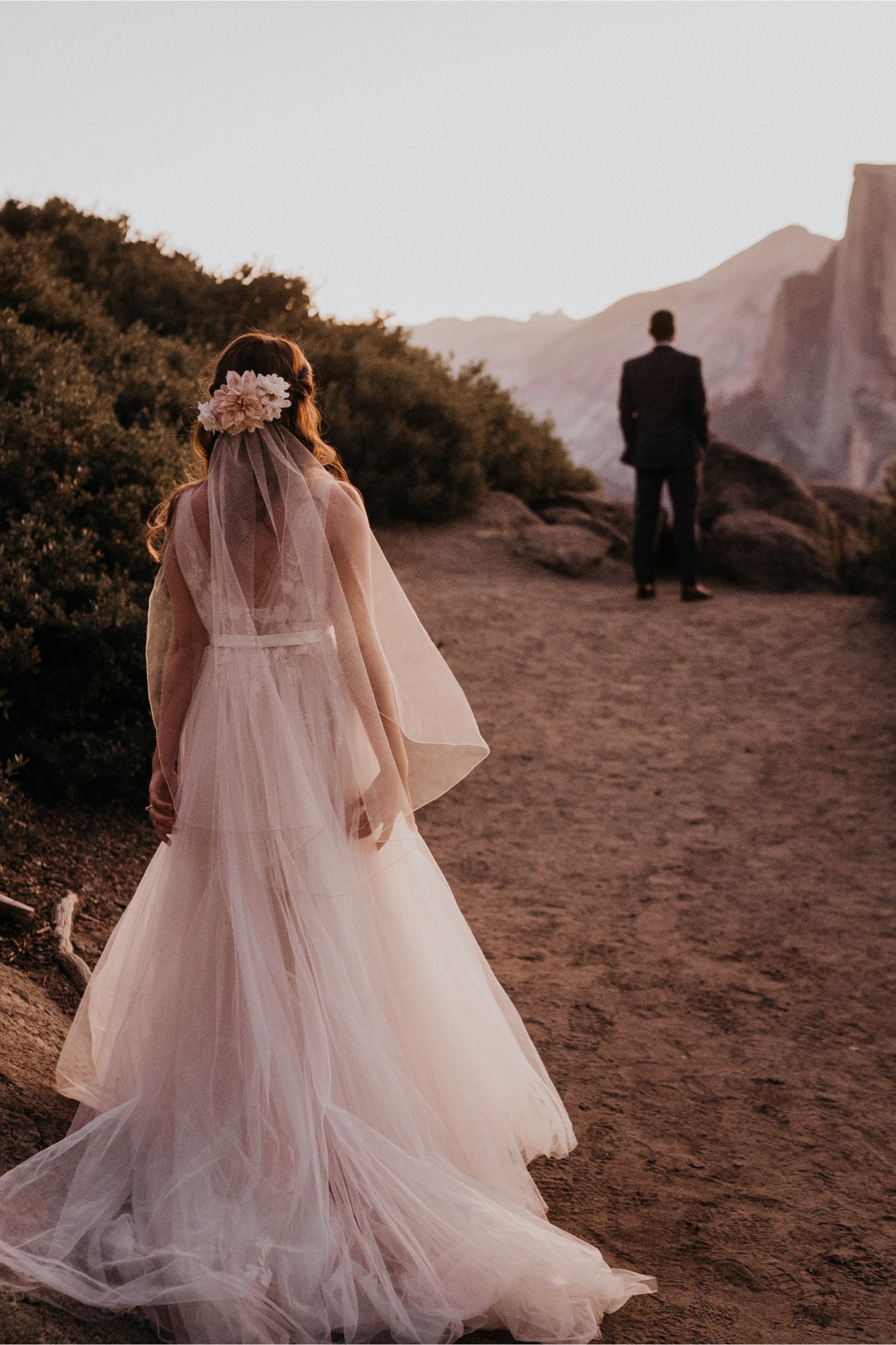 First look photos of bride and groom on their adventure elopement at Yosemite National Park Glacier Point