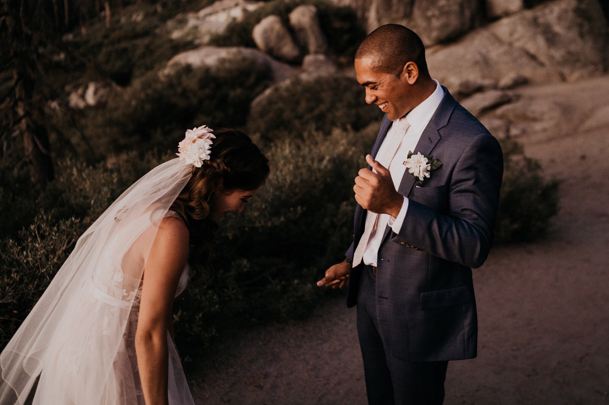 First look photos of bride and groom on their adventure elopement at Yosemite National Park Glacier Point