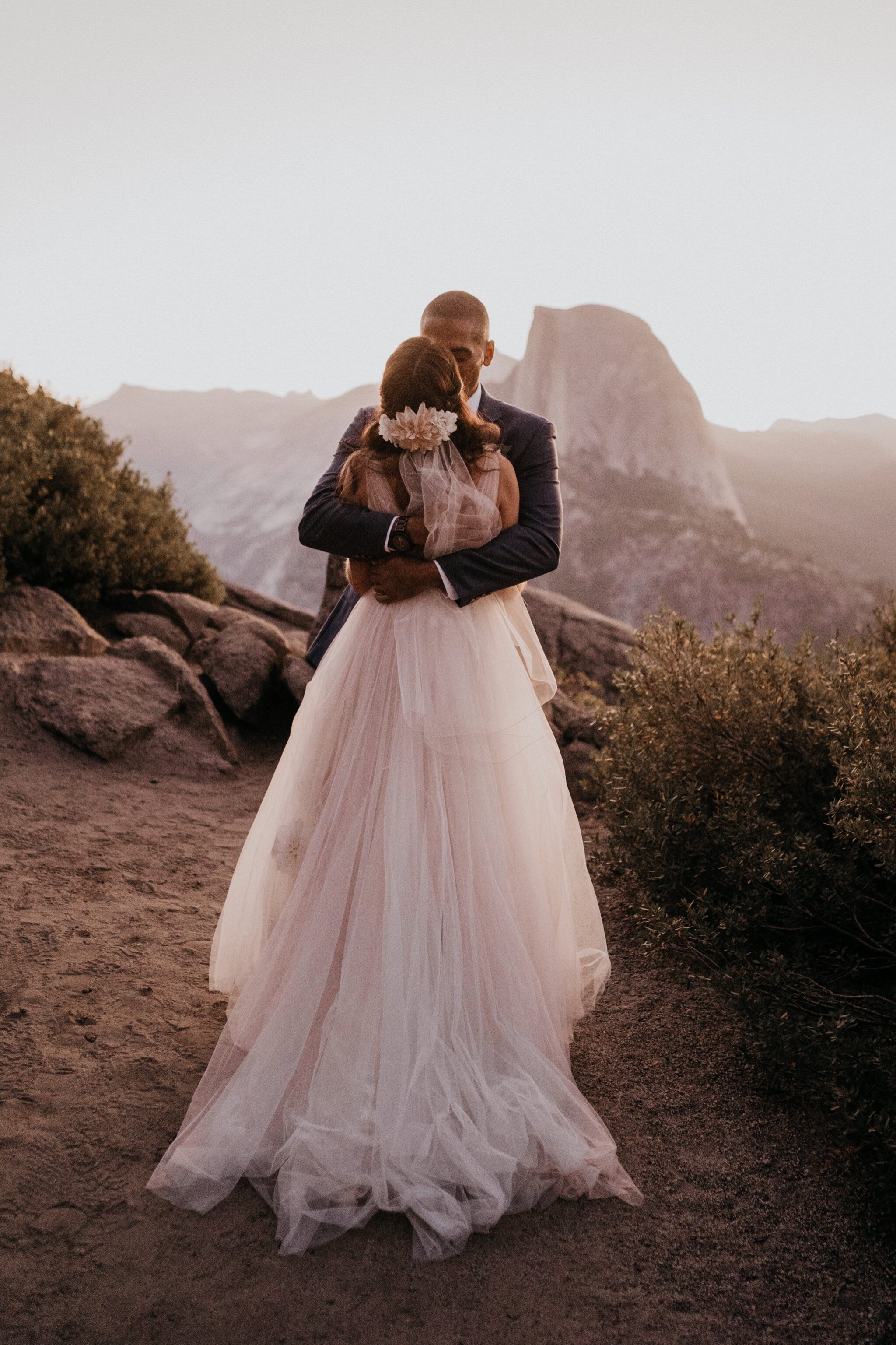 First look photos of bride and groom on their adventure elopement at Yosemite National Park Glacier Point