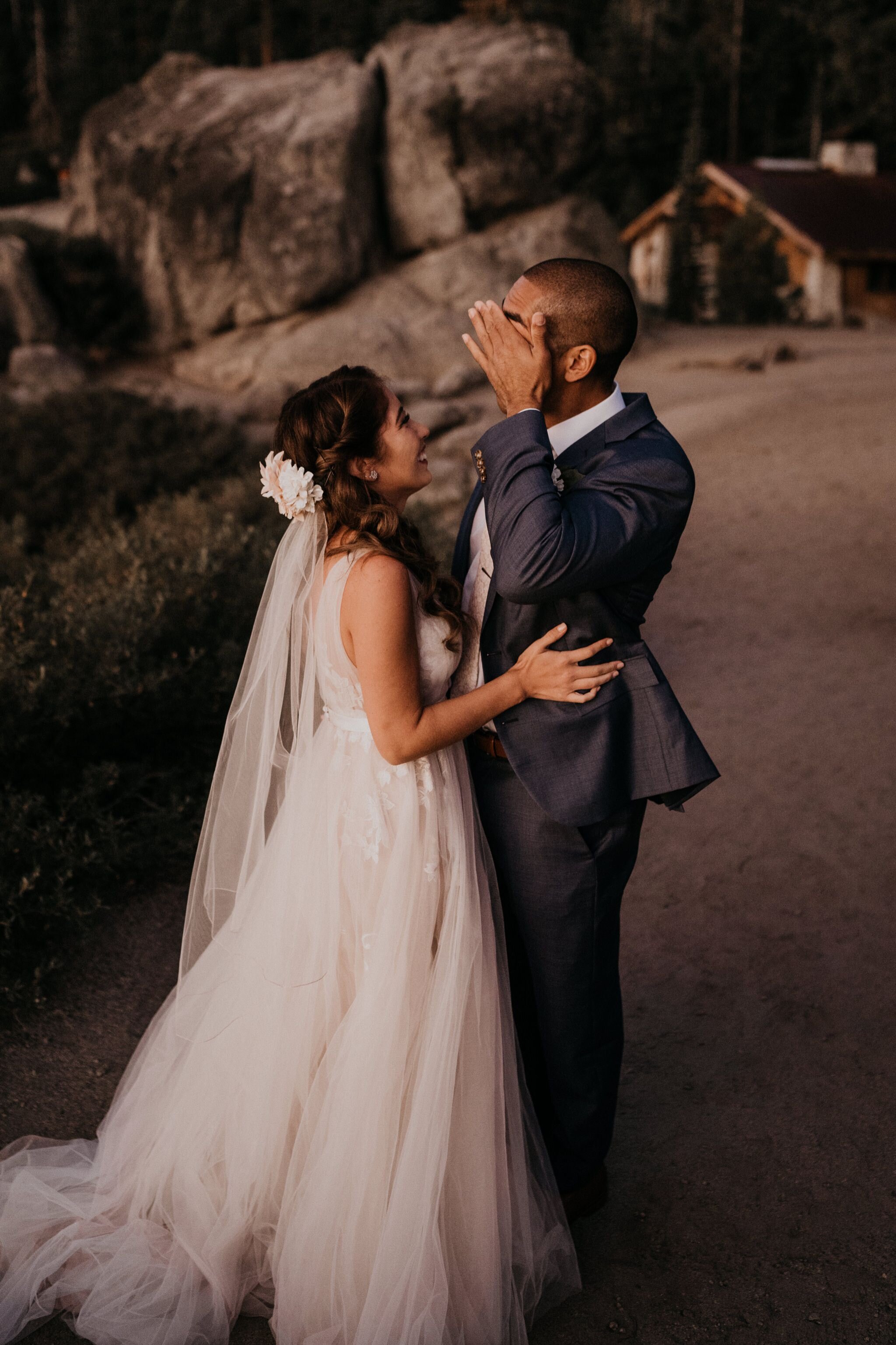 Emotional First look photos of bride and groom crying on their adventure elopement at Yosemite National Park Glacier Point