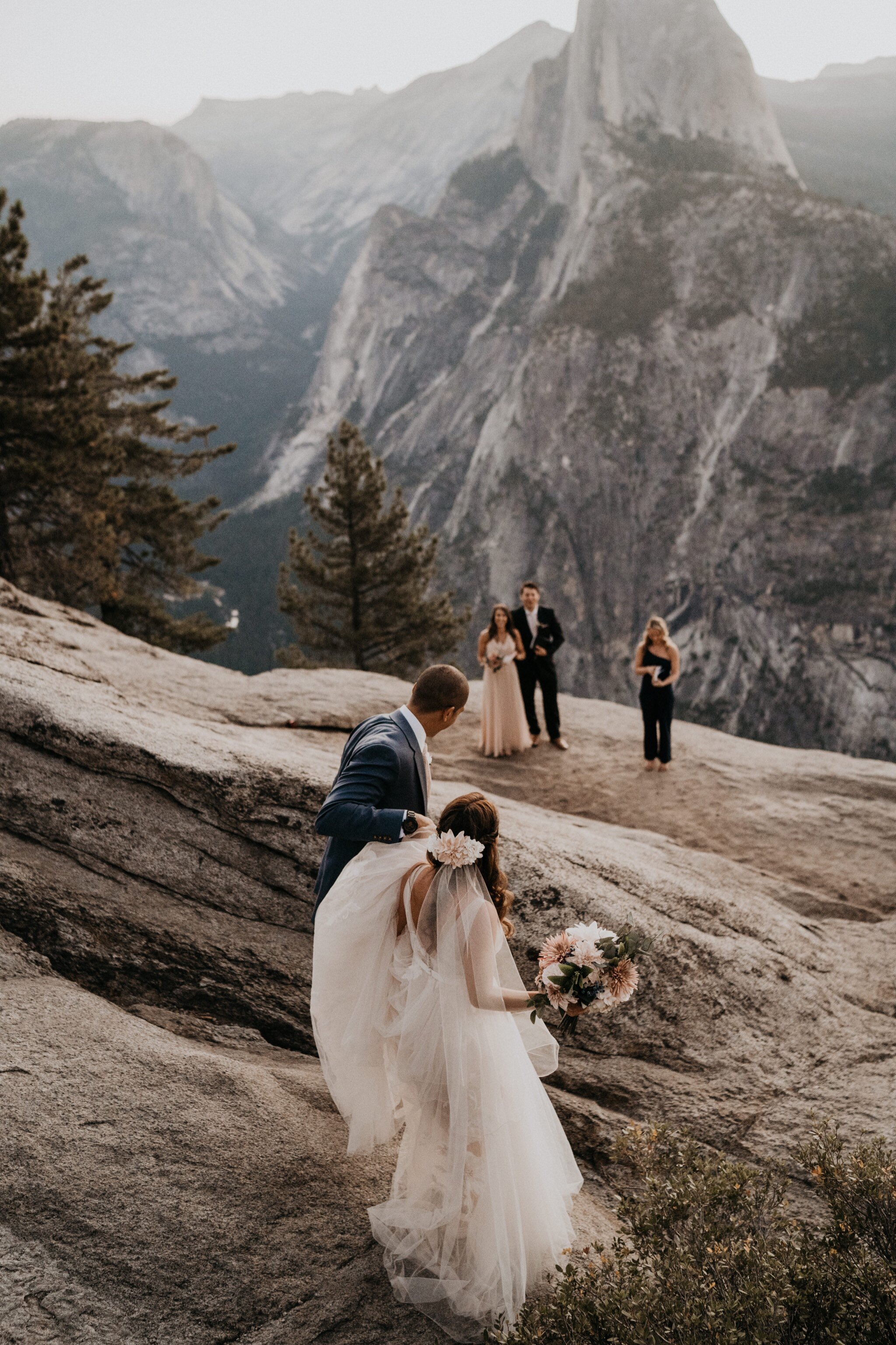 Yosemite National Park elopement photos at Glacier Point during sunrise with view of Half Dome