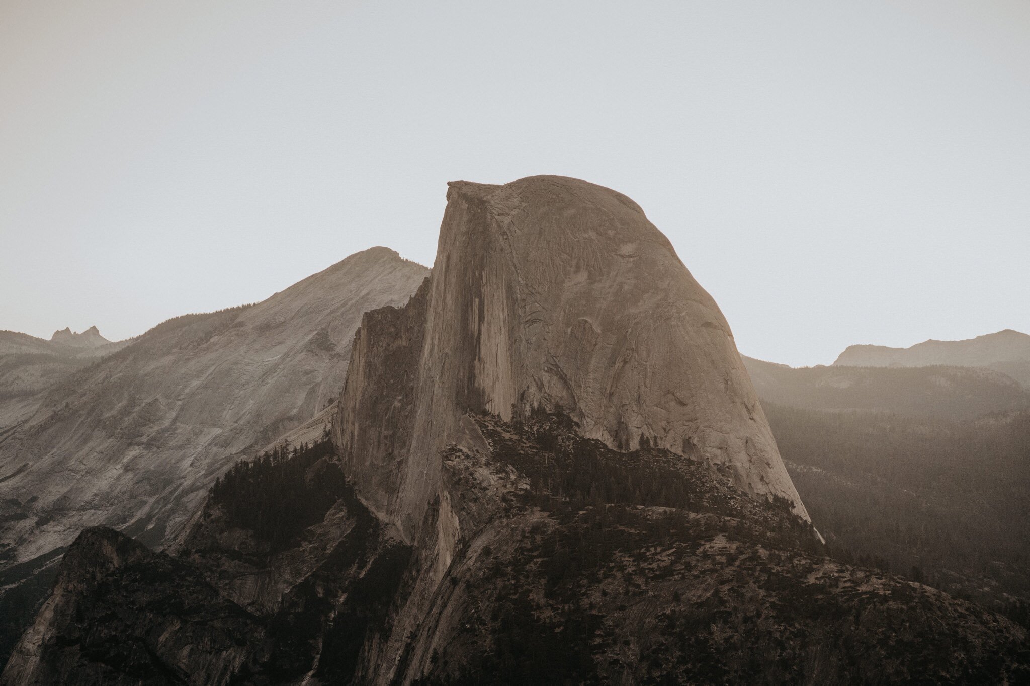 Yosemite National Park elopement photos at Glacier Point during sunrise with view of Half Dome