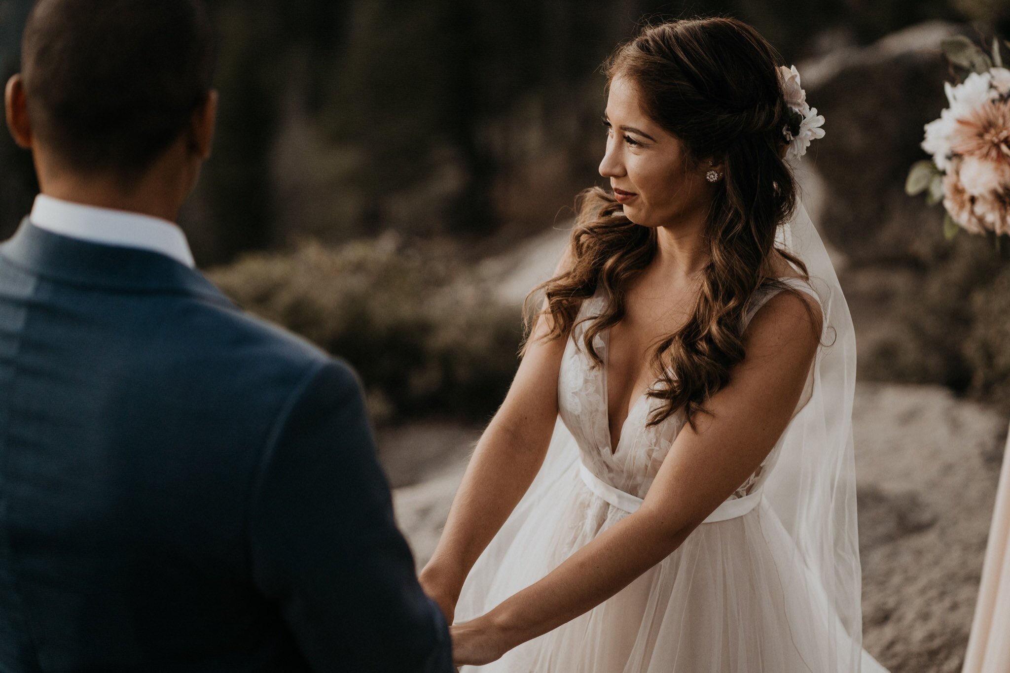 Yosemite National Park elopement and wedding photos at Glacier Point during sunrise with view of Half Dome