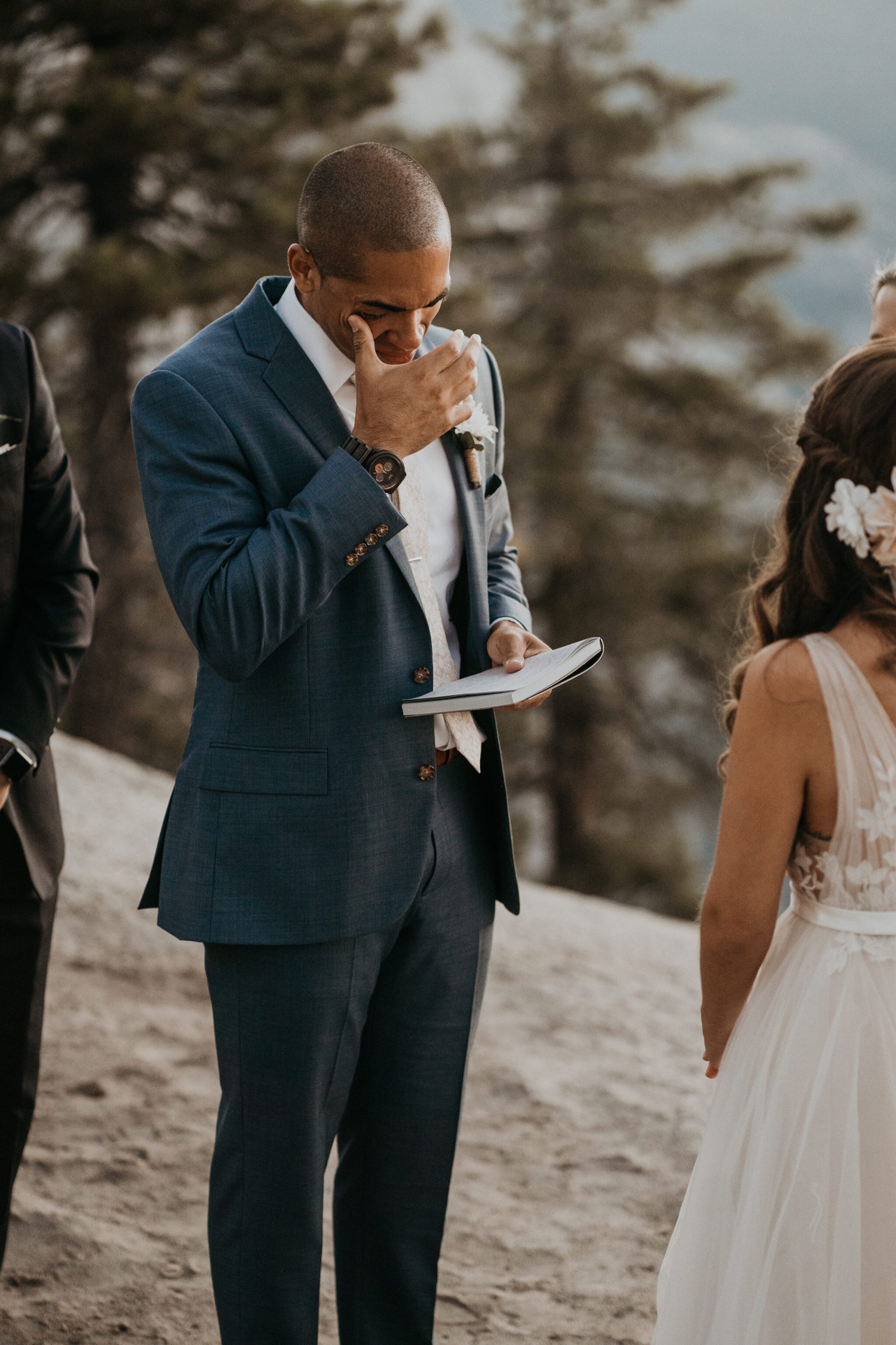 Groom crying | Yosemite National Park elopement and wedding photos at Glacier Point during sunrise with view of Half Dome