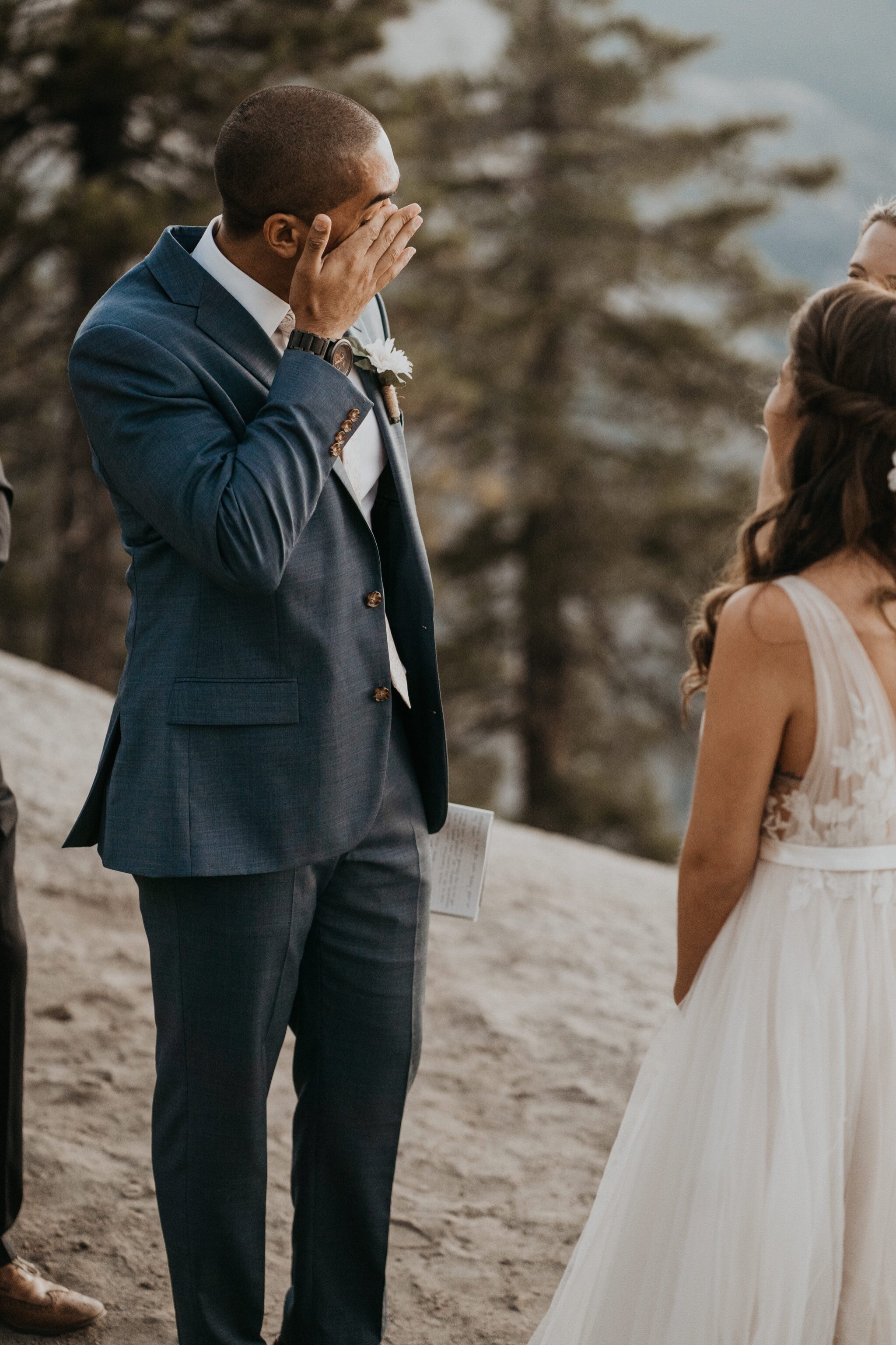 Groom crying | Yosemite National Park elopement and wedding photos at Glacier Point during sunrise with view of Half Dome