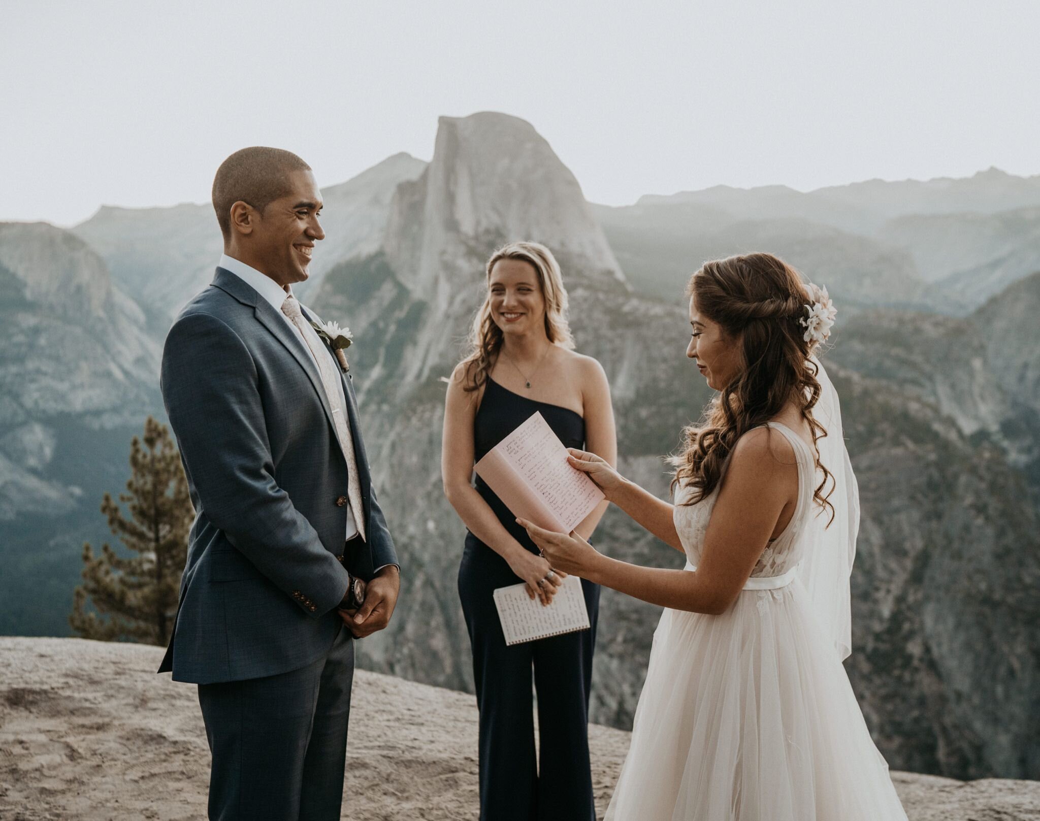 Yosemite National Park elopement and wedding photos at Glacier Point during sunrise with view of Half Dome